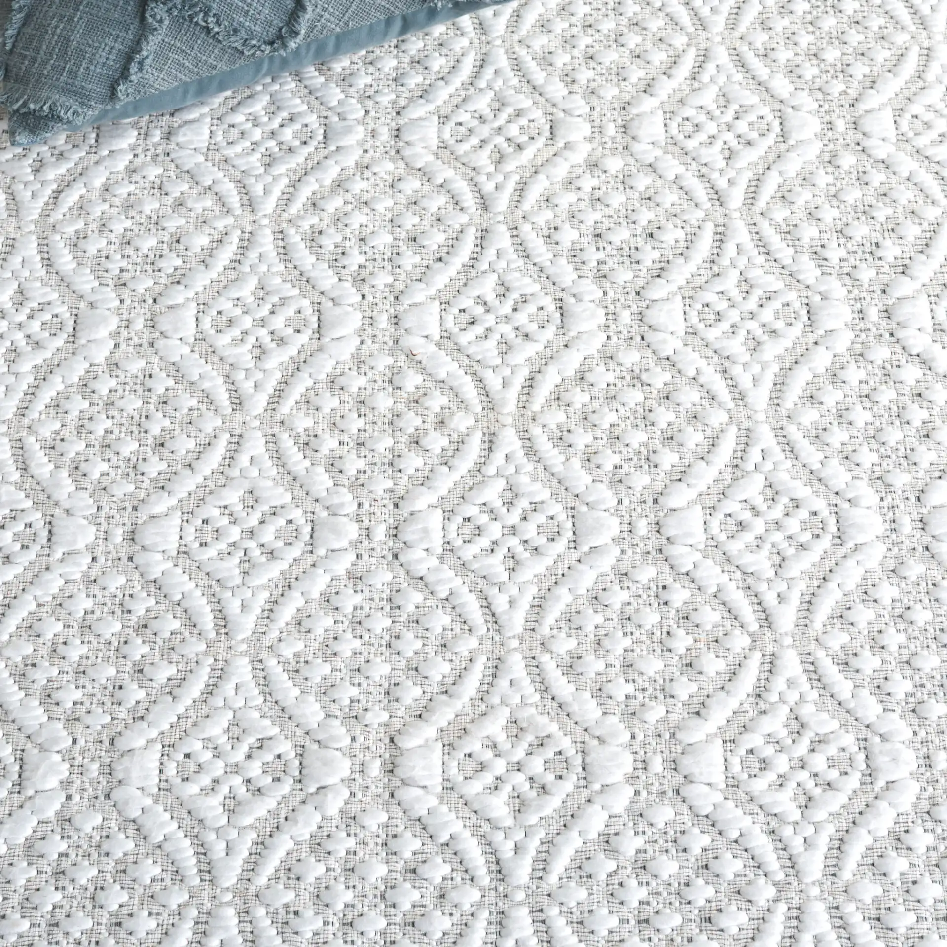 Marbella Interlocking Circles Hand-Woven Rug in Ivory in a styled room
