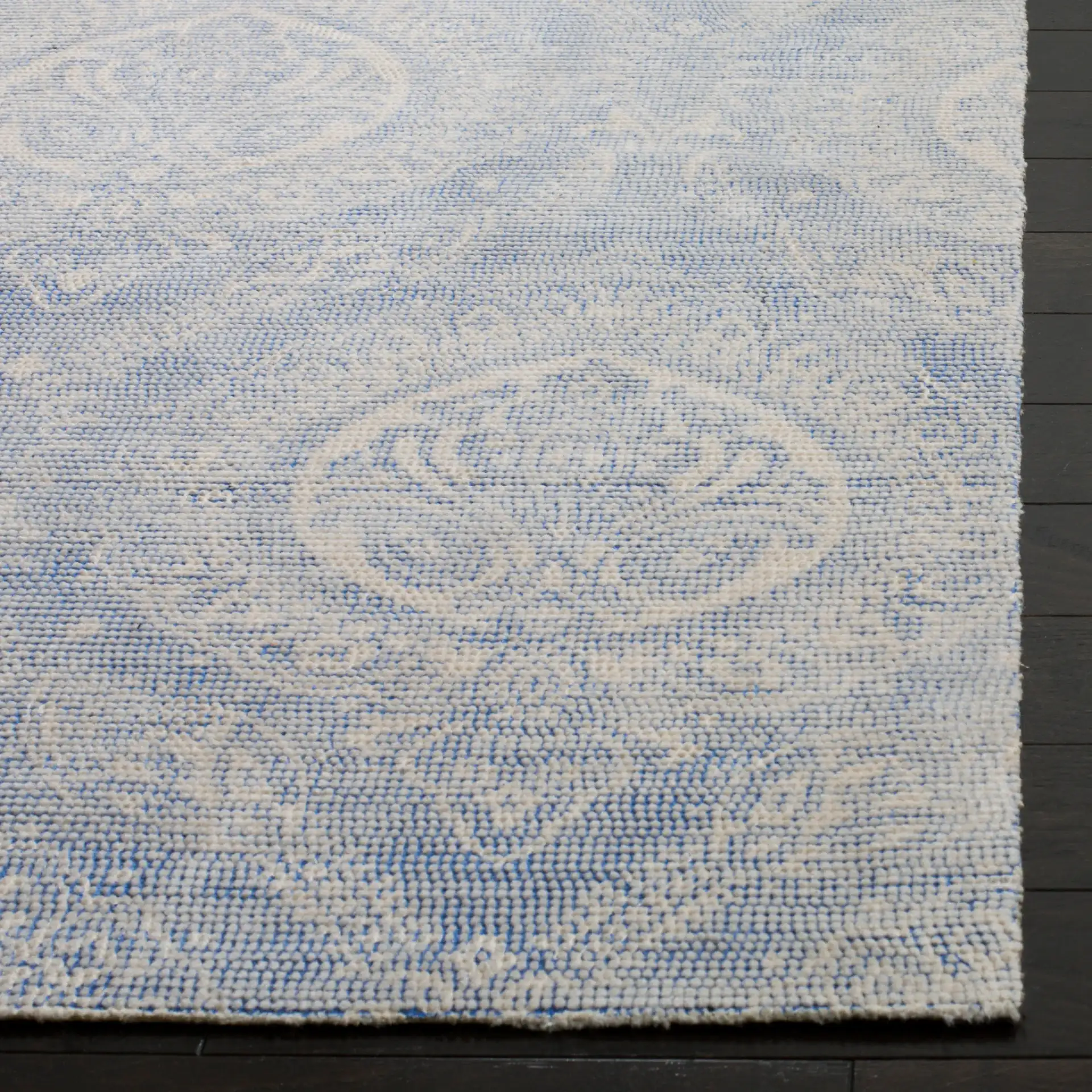 Marbella Damask Hand-Loomed Rug in Blue / Ivory in a styled room