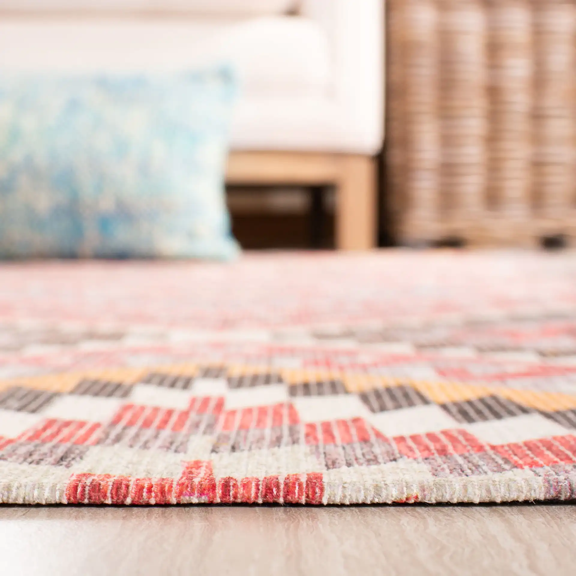 Marbella Southwestern Diamond Hand-Woven Rug in Red / Gold in a styled room