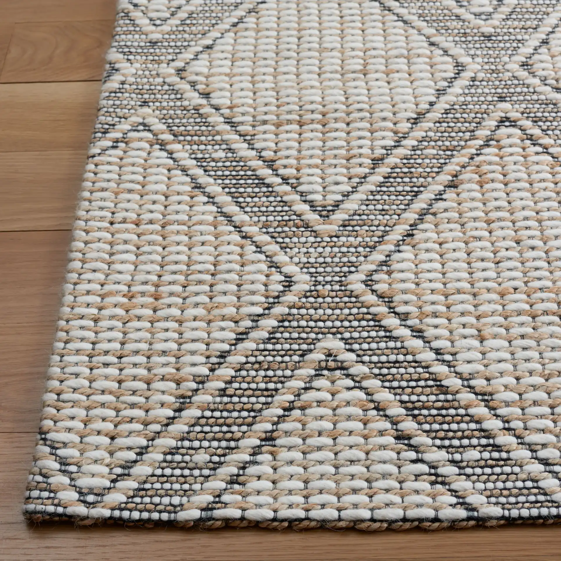 Marbella Modern Trellis Hand-Loomed Rug in Natural / Ivory in a styled room