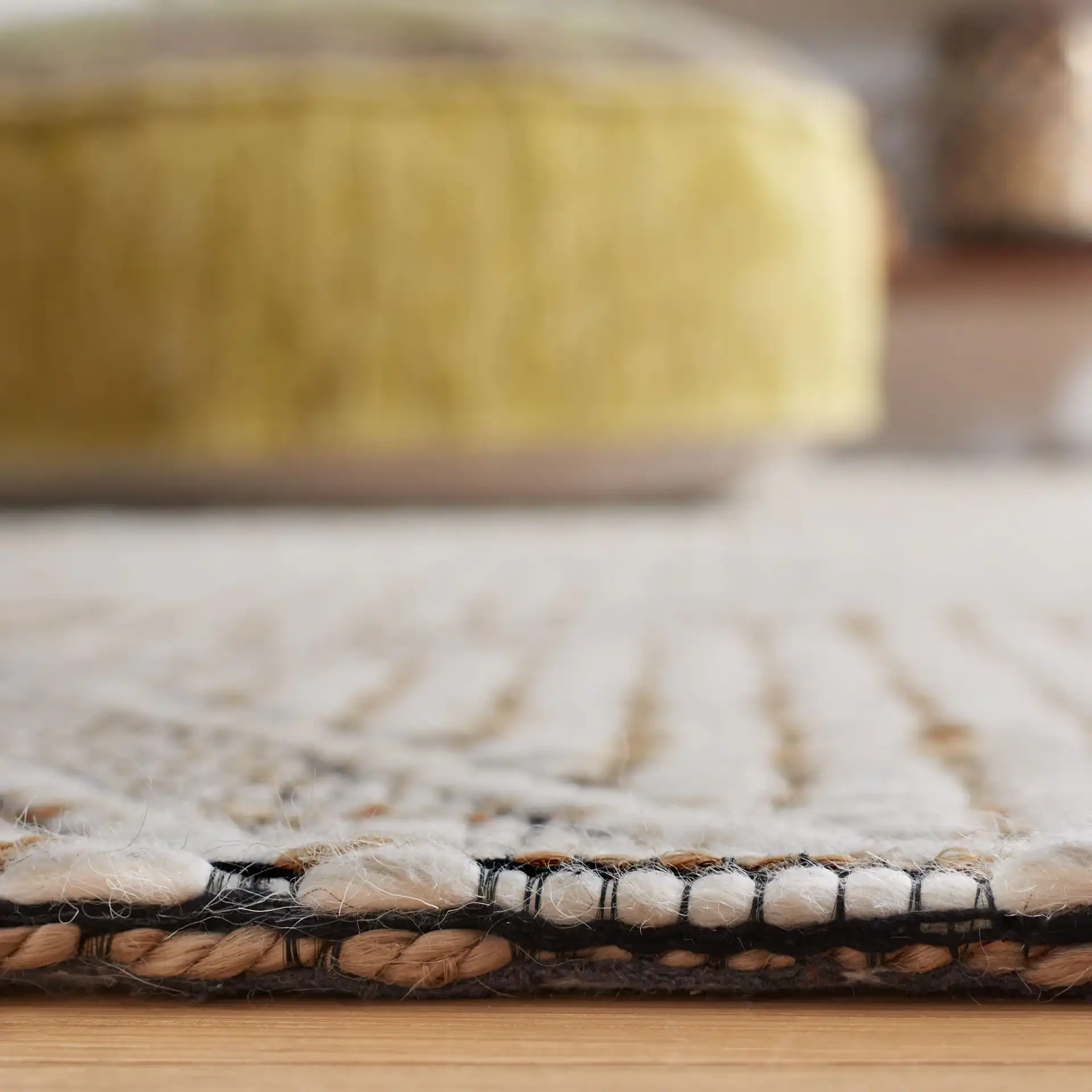 Marbella Modern Trellis Hand-Loomed Rug in Natural / Ivory in a styled room
