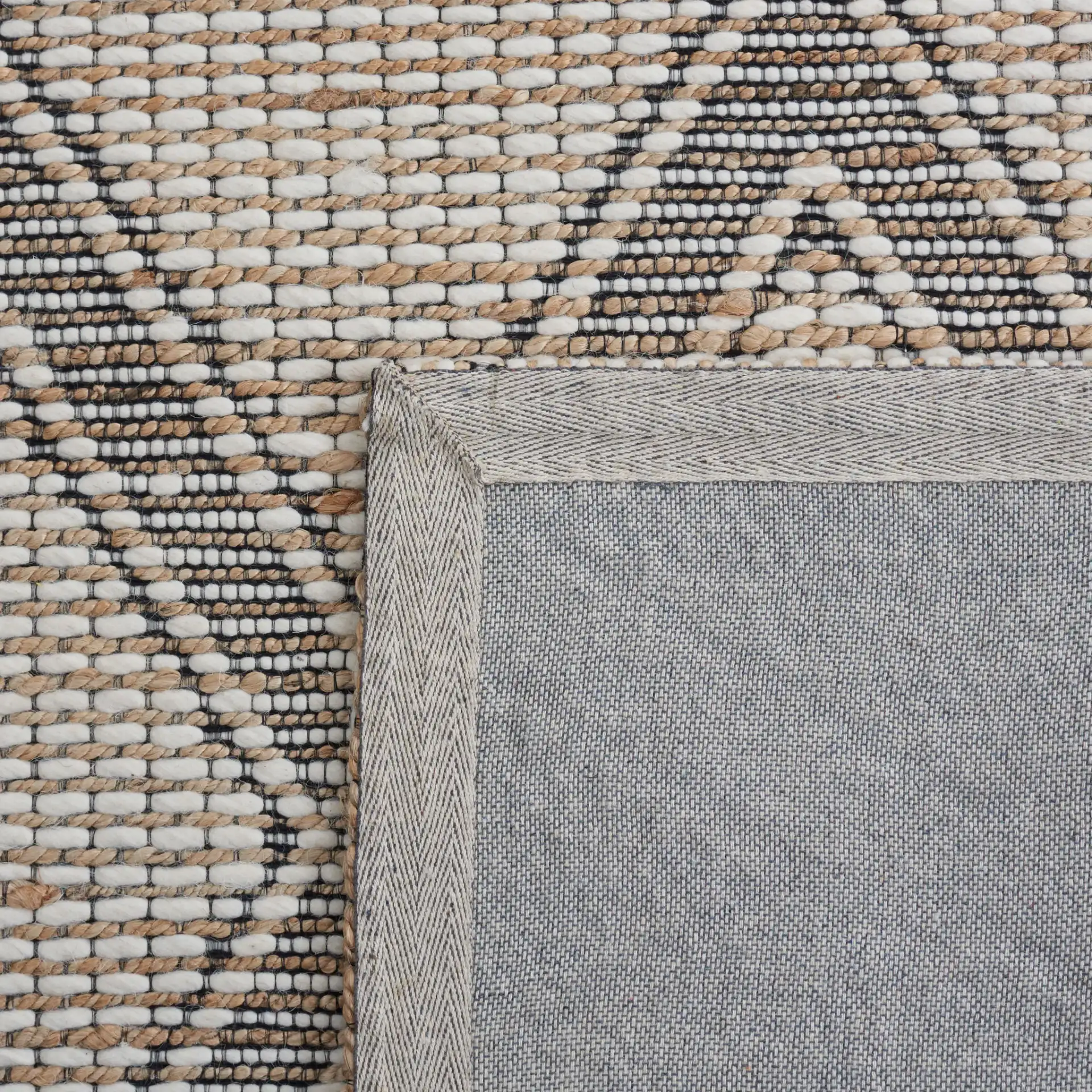 Marbella Modern Trellis Hand-Loomed Rug in Natural / Ivory in a styled room