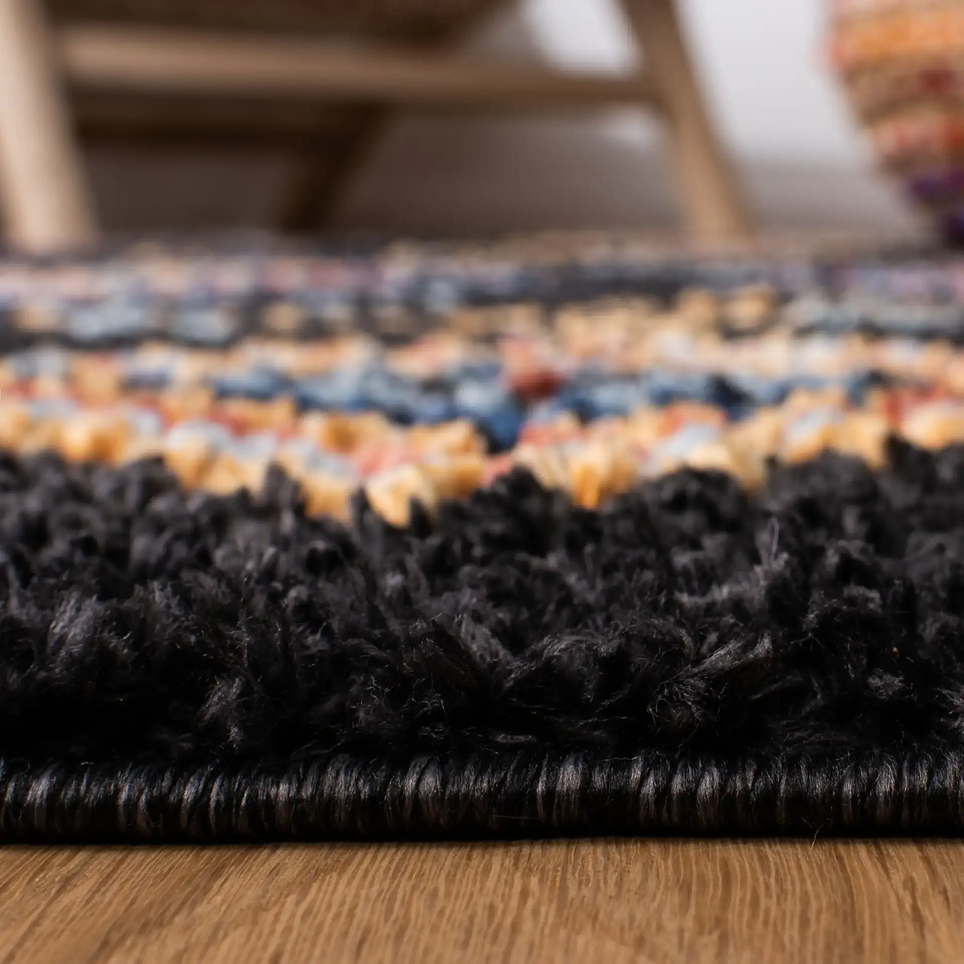 Morocco Diamond Column Shag Rug in Black / Navy in a styled room
