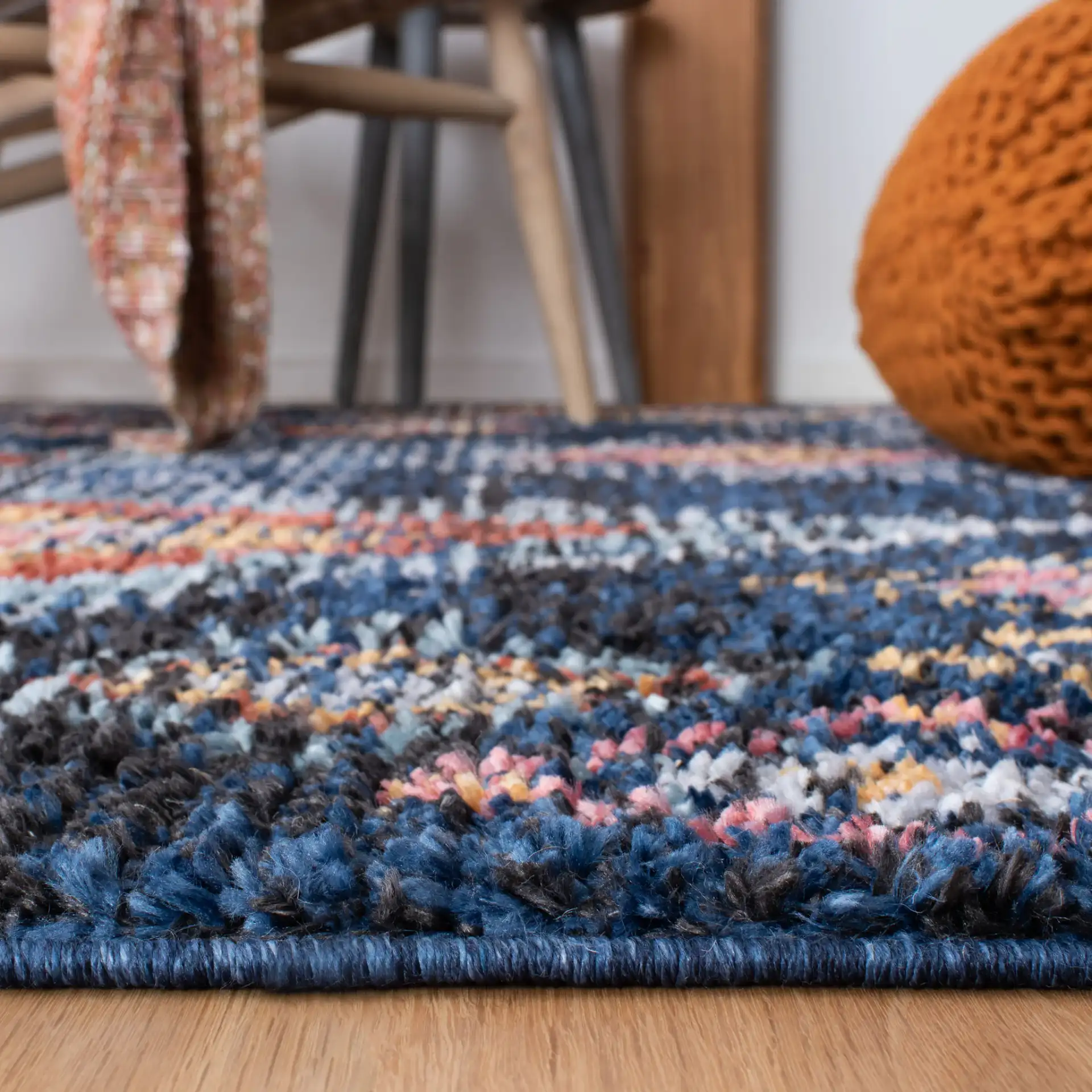 Morocco Nested Diamond Shag Rug in Navy / Multicolor in a styled room
