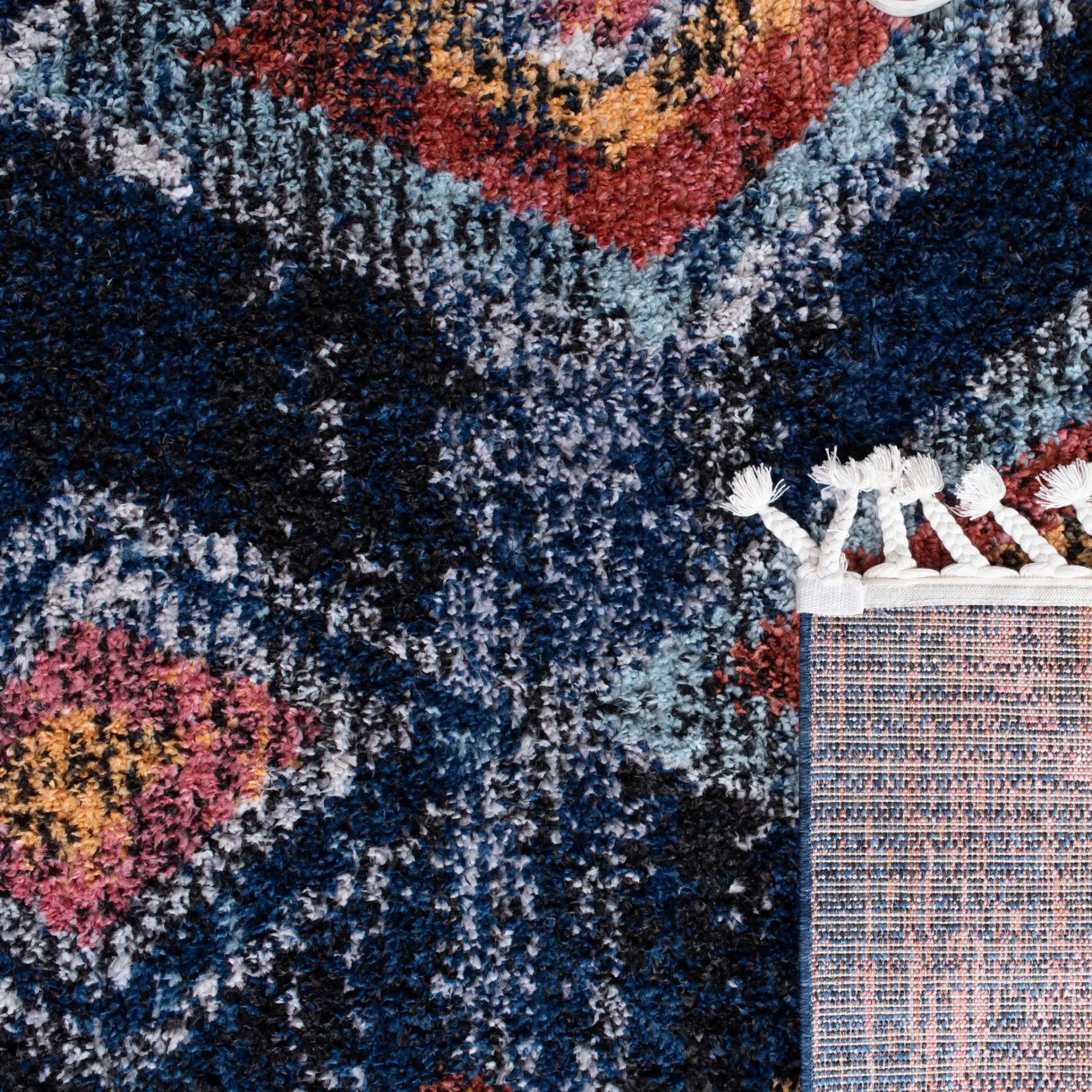 Morocco Nested Diamond Shag Rug in Navy / Multicolor in a styled room