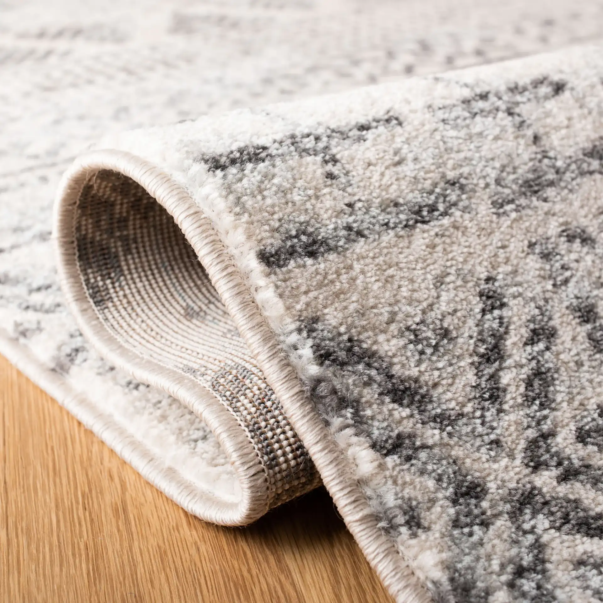Mercer Banded Tribal Rug in Ivory / Gray in a styled room