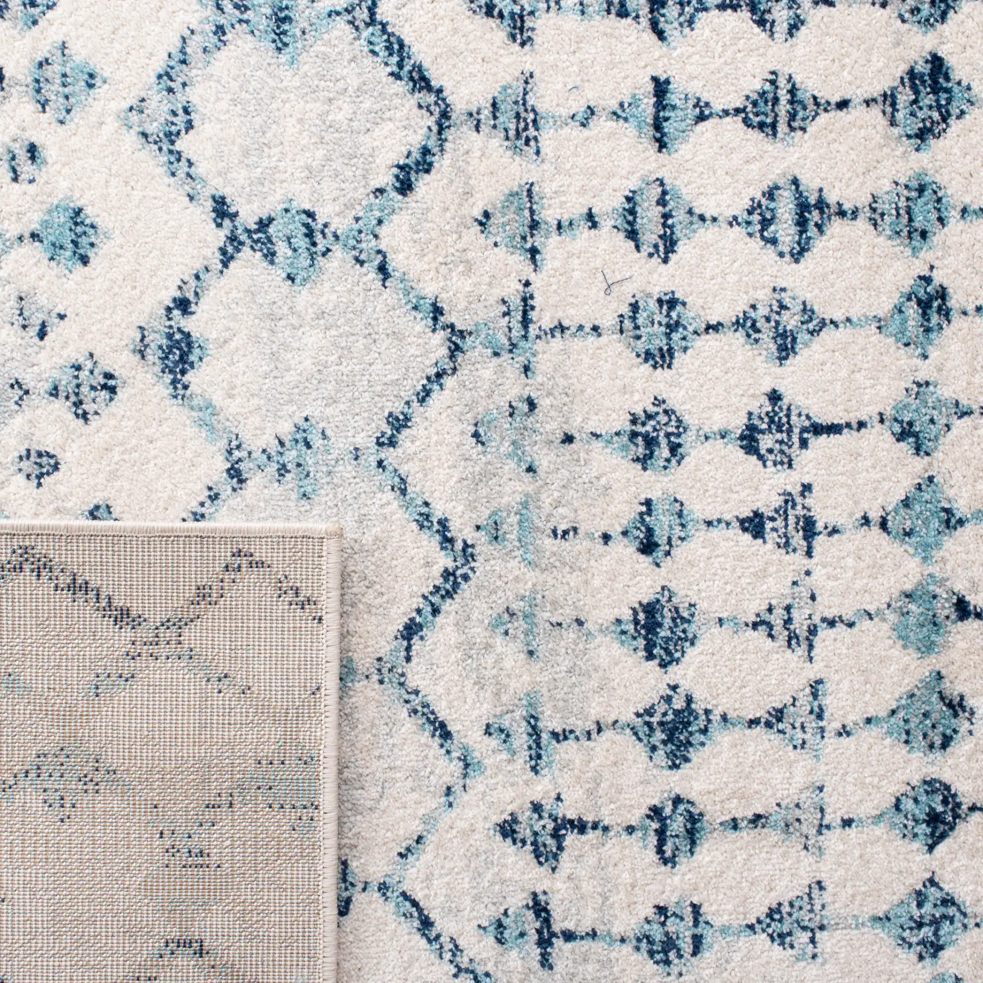 Mercer Lattice Band Rug in Ivory / Turquoise in a styled room