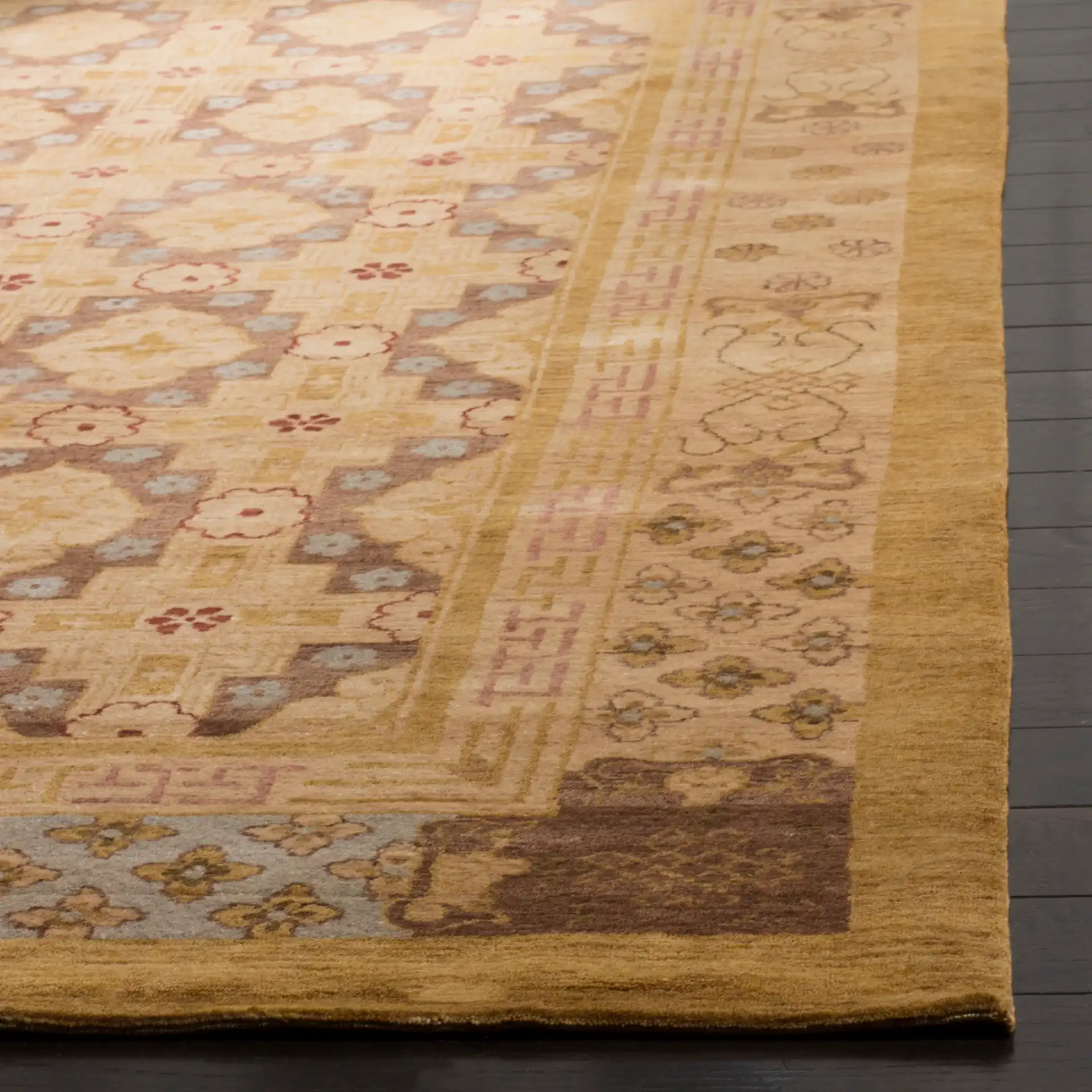Marrakesh Tile Hand-Knotted Wool Rug in Gold / Light Blue in a styled room