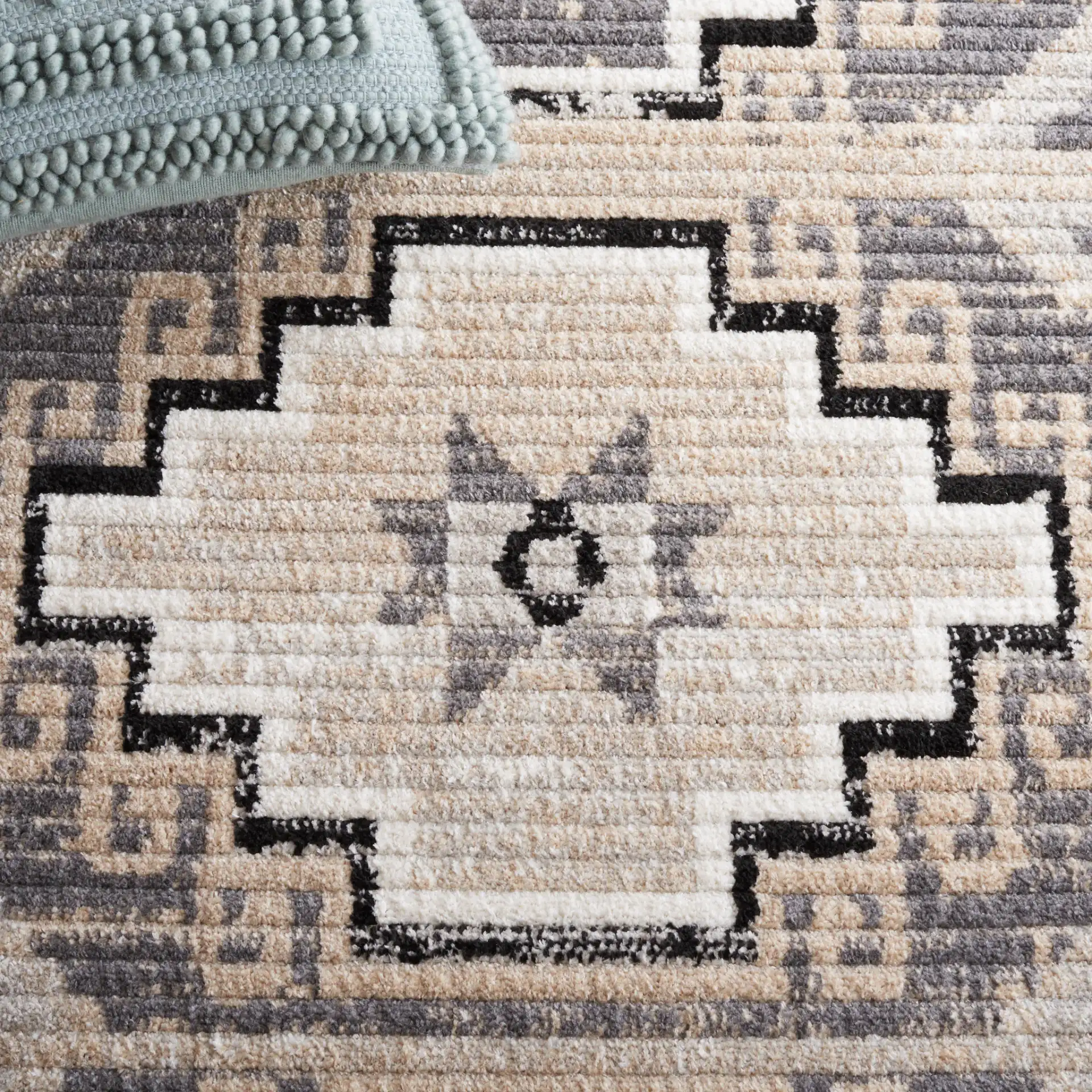 Marrakesh Southwestern Diamond Medallion Rug in Beige / Gray in a styled room