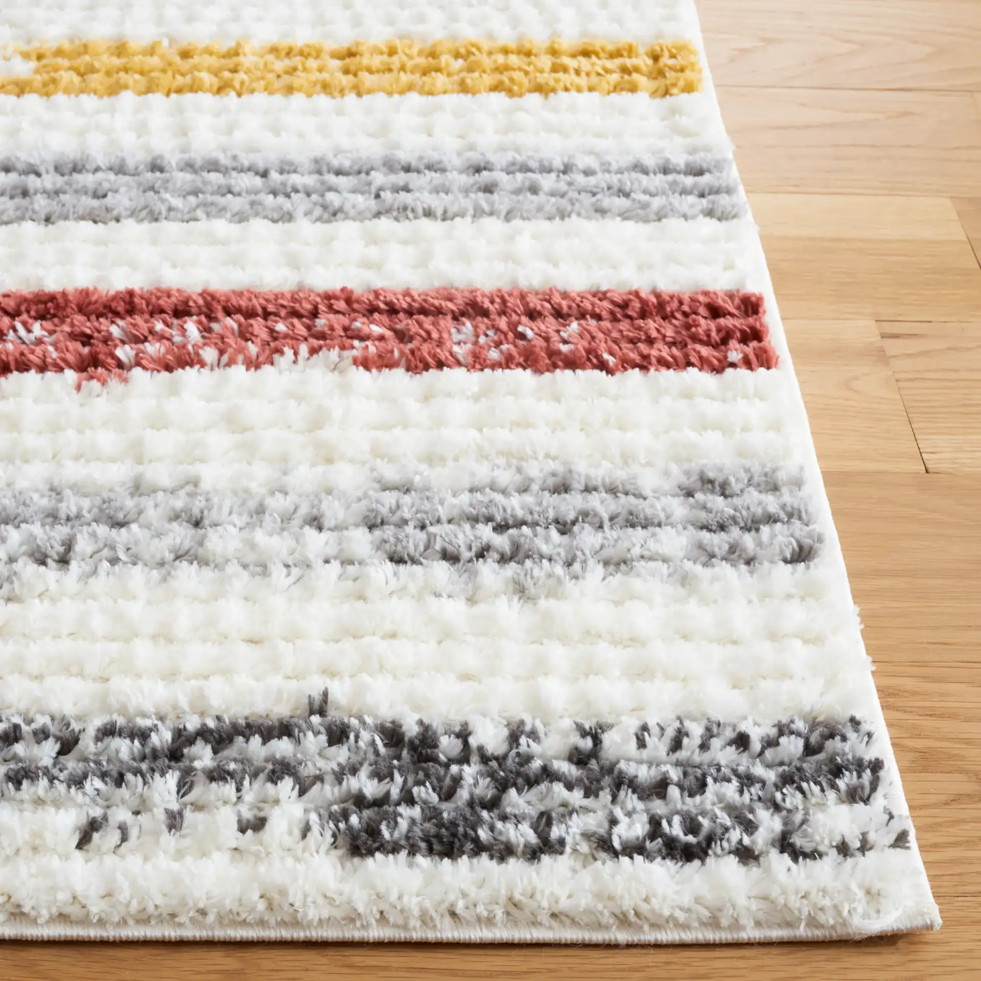 Marrakesh Dashed Stripe Rug in Ivory / Gray in a styled room