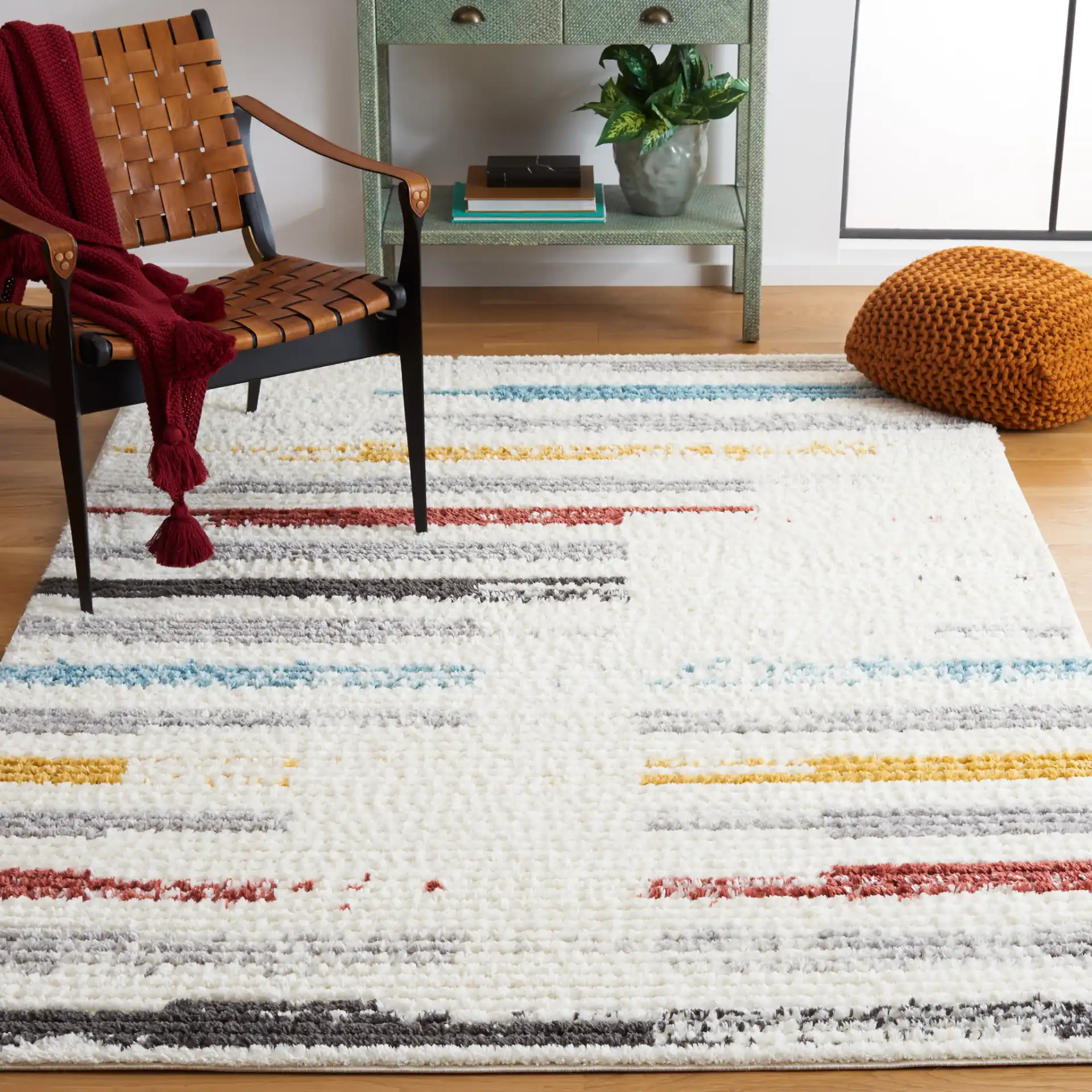 Marrakesh Dashed Stripe Rug in Ivory / Gray in a styled room