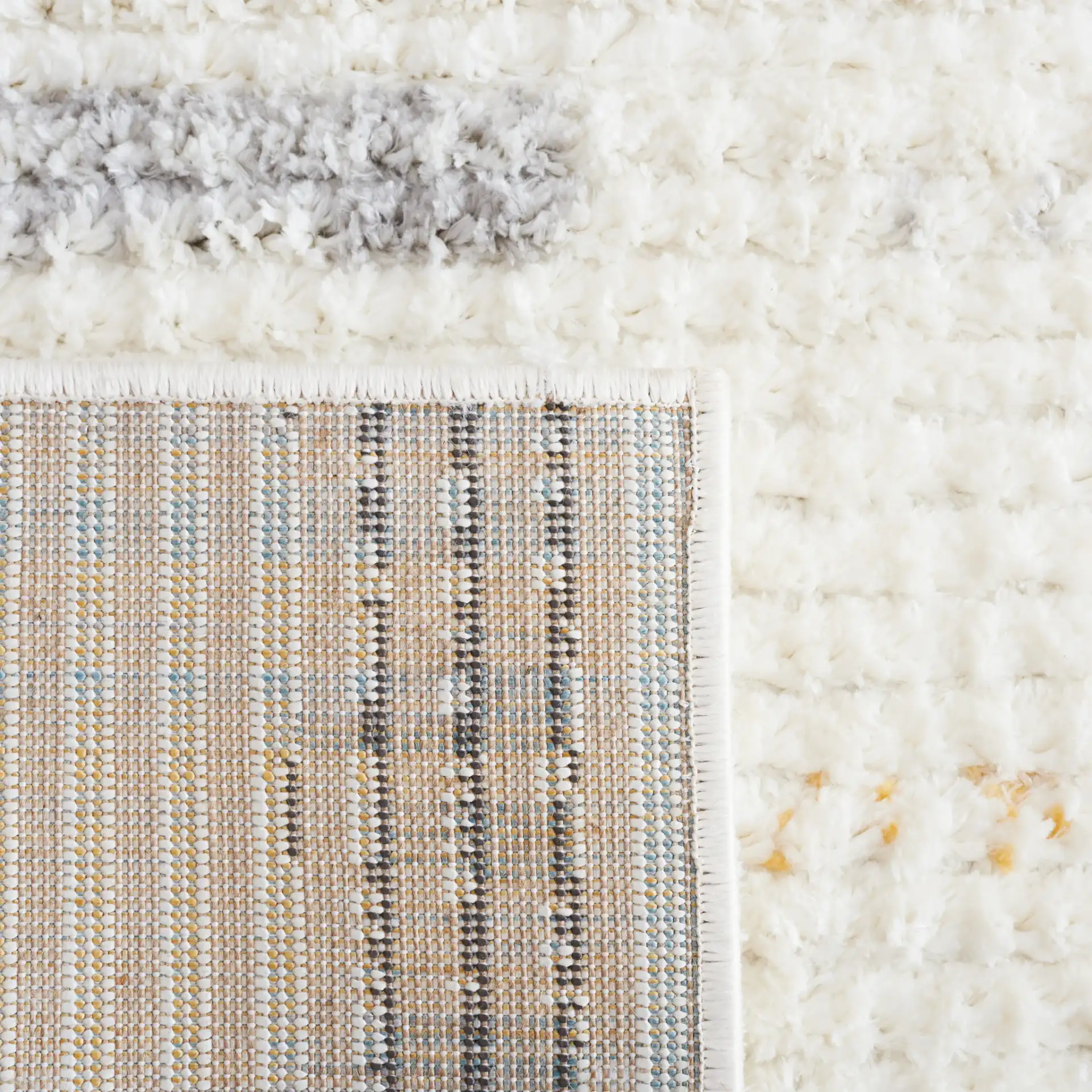 Marrakesh Dashed Stripe Rug in Ivory / Gray in a styled room