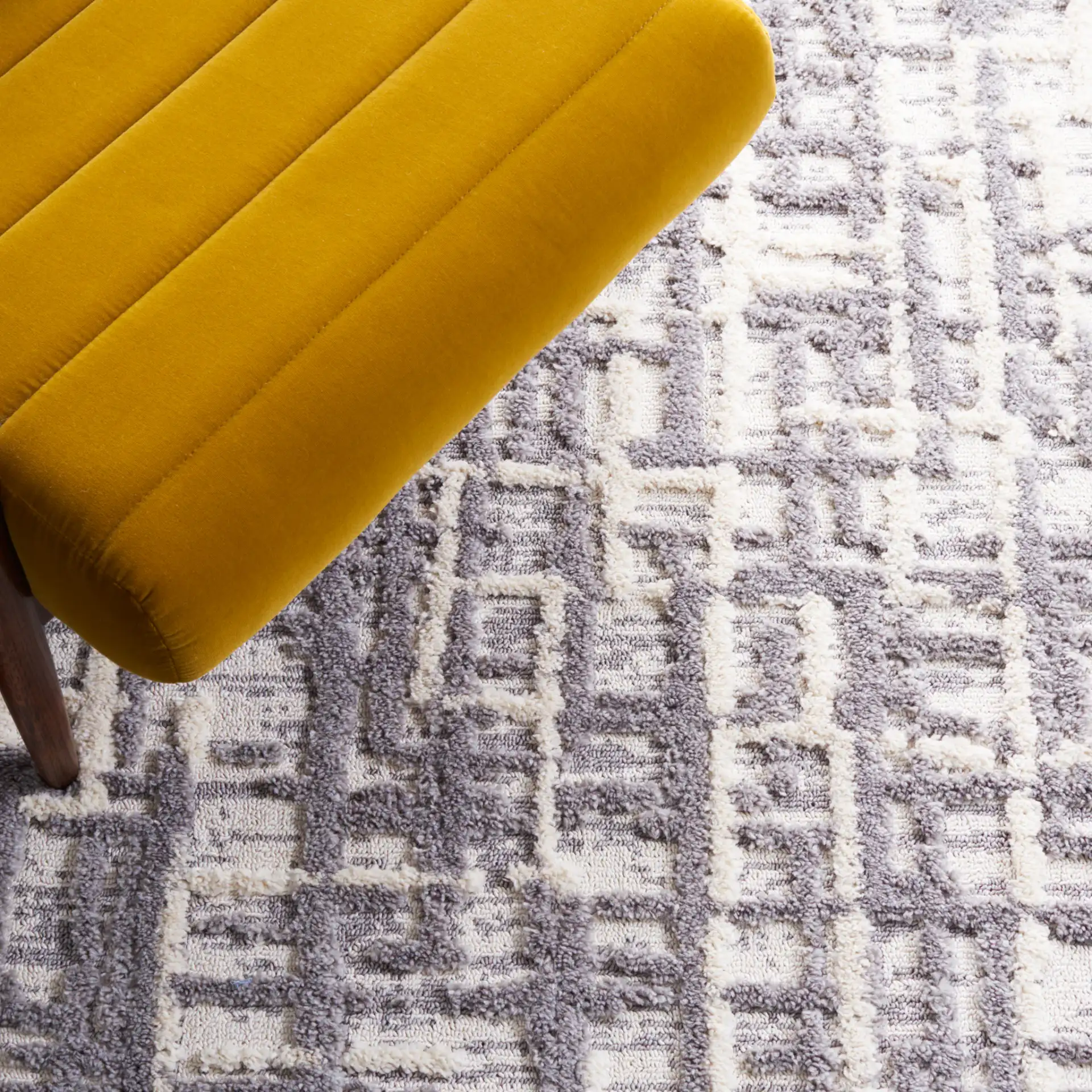 Marrakesh Abstract Grid Rug in Ivory / Dark Gray in a styled room