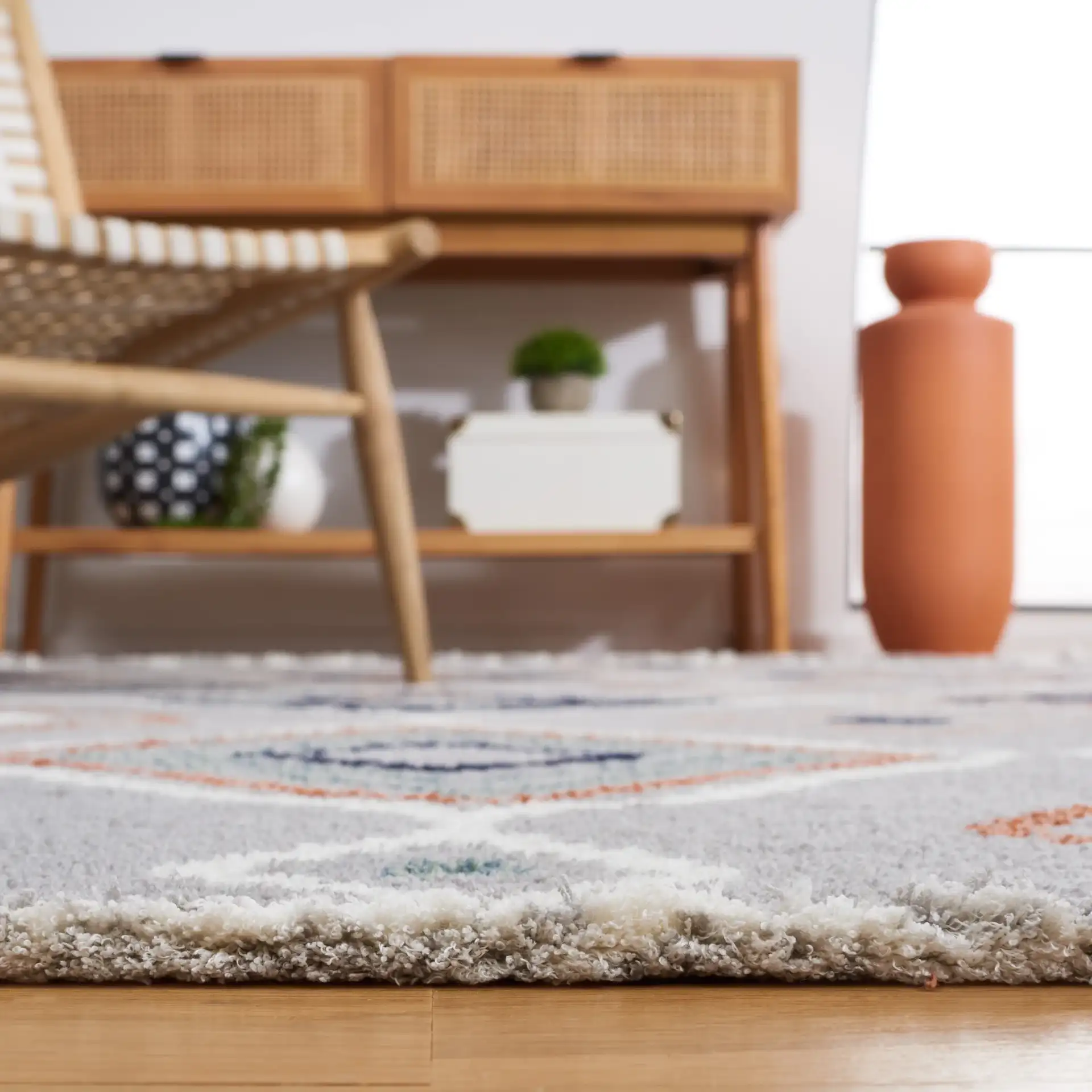 Marrakesh Tribal Diamond Lattice Rug in Gray / Blue Rust in a styled room