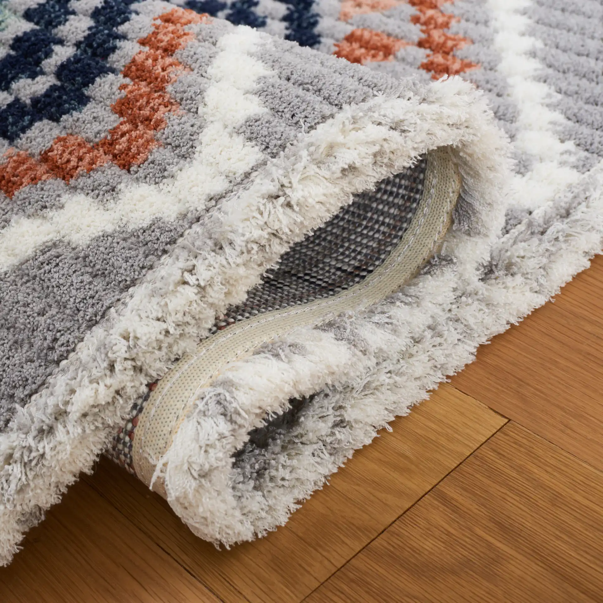 Marrakesh Tribal Diamond Lattice Rug in Gray / Blue Rust in a styled room