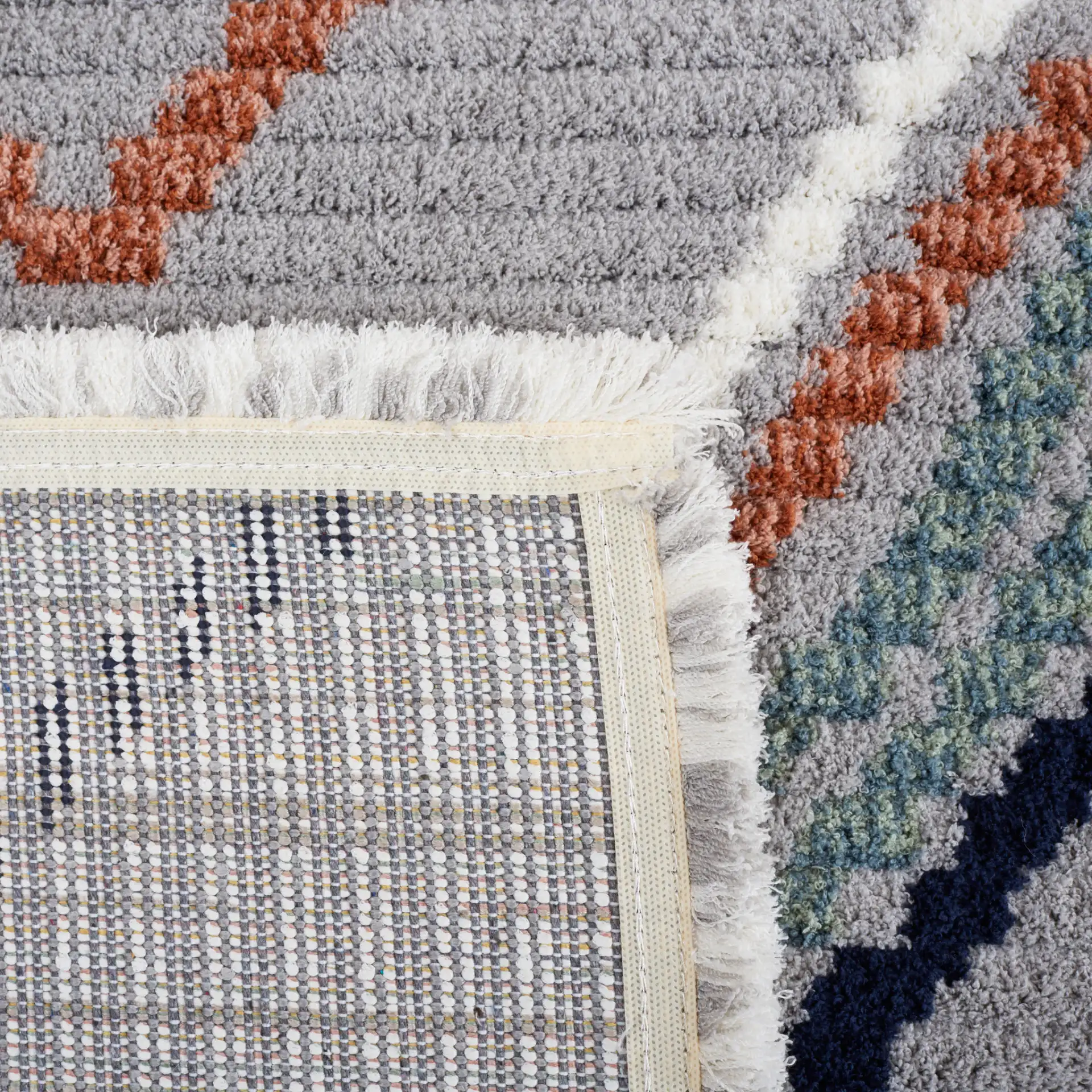 Marrakesh Tribal Diamond Lattice Rug in Gray / Blue Rust in a styled room