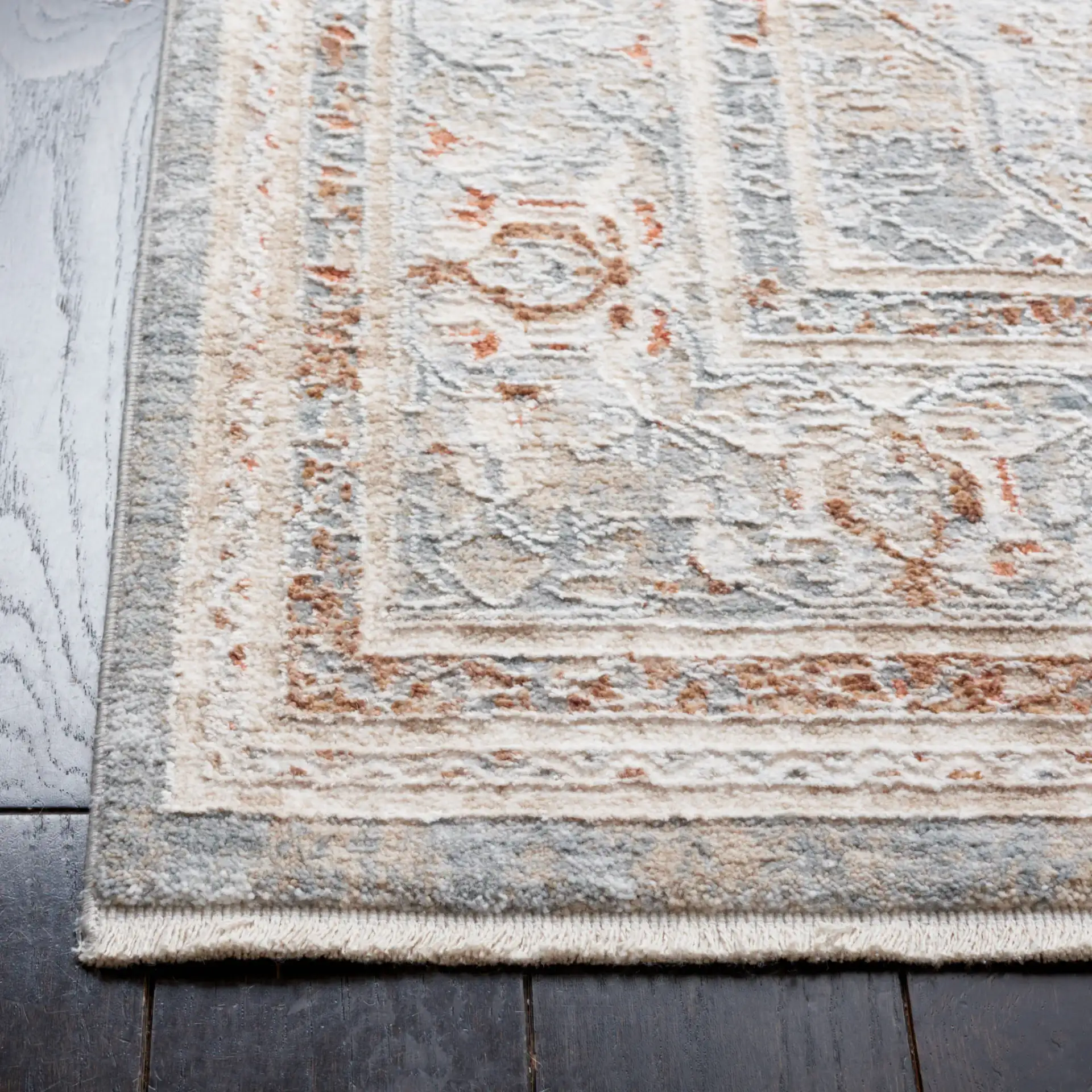 Marmara Medallion Bordered Rug in Beige / Blue Rust in a styled room