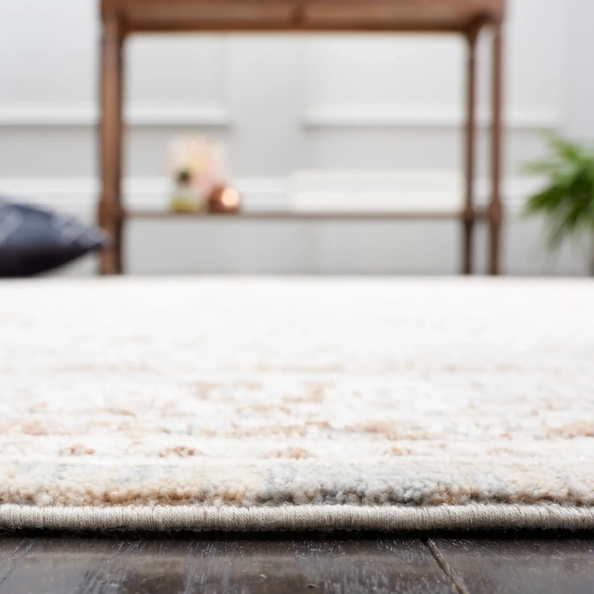 Marmara Medallion Bordered Rug in Beige / Blue Rust in a styled room