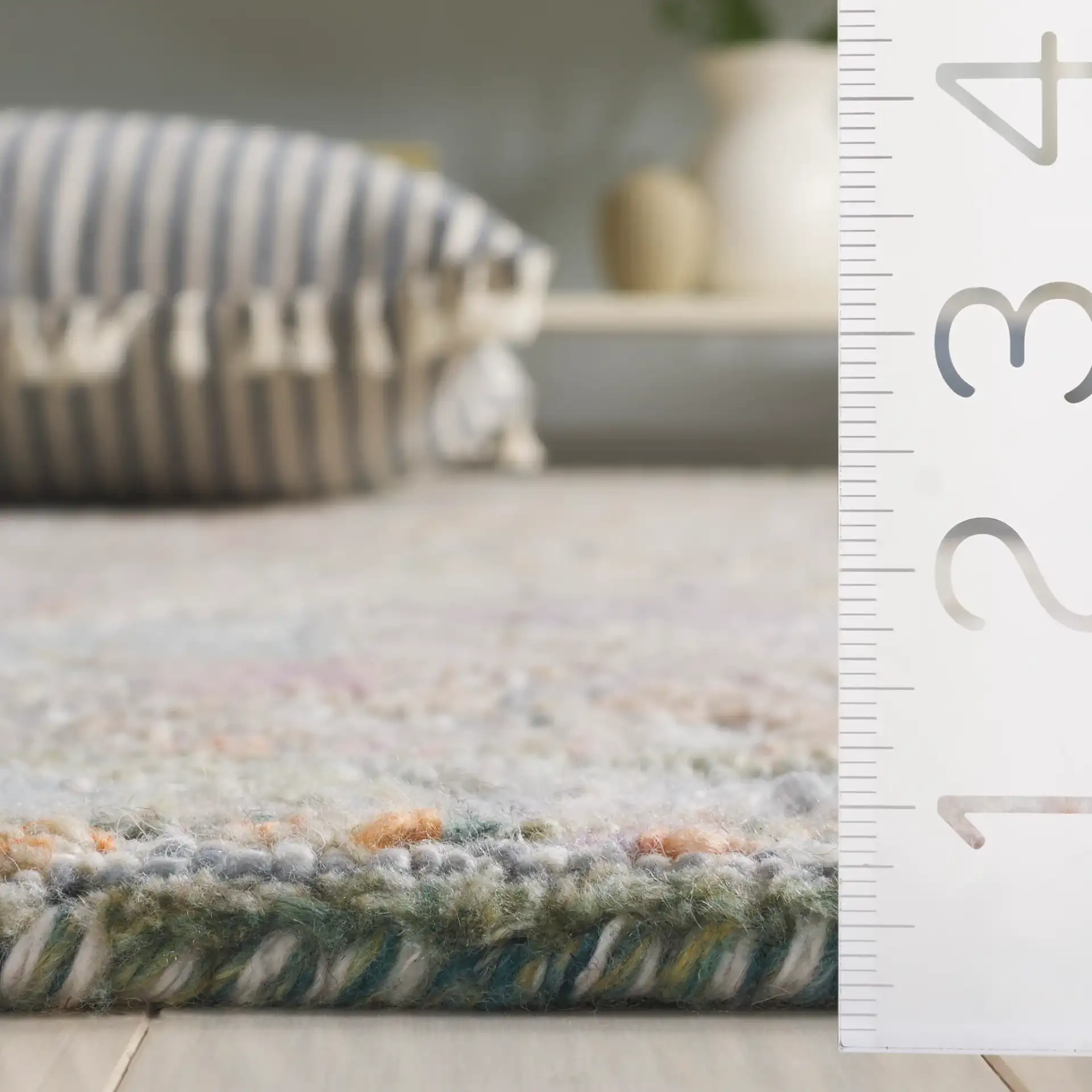 Marquee Medallion Hand-Tufted Rug in Green / Ivory in a styled room