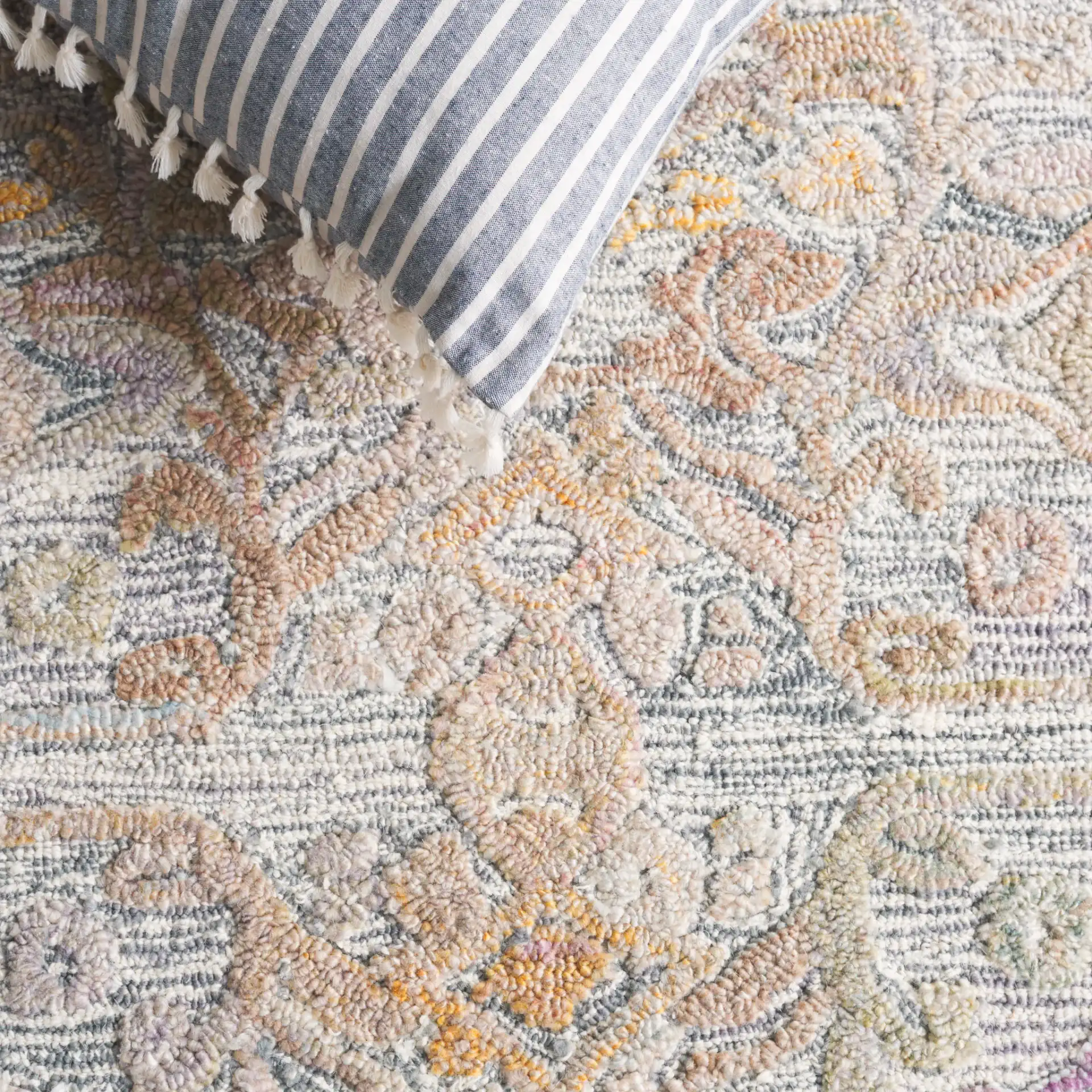 Marquee Medallion Hand-Tufted Rug in Green / Ivory in a styled room