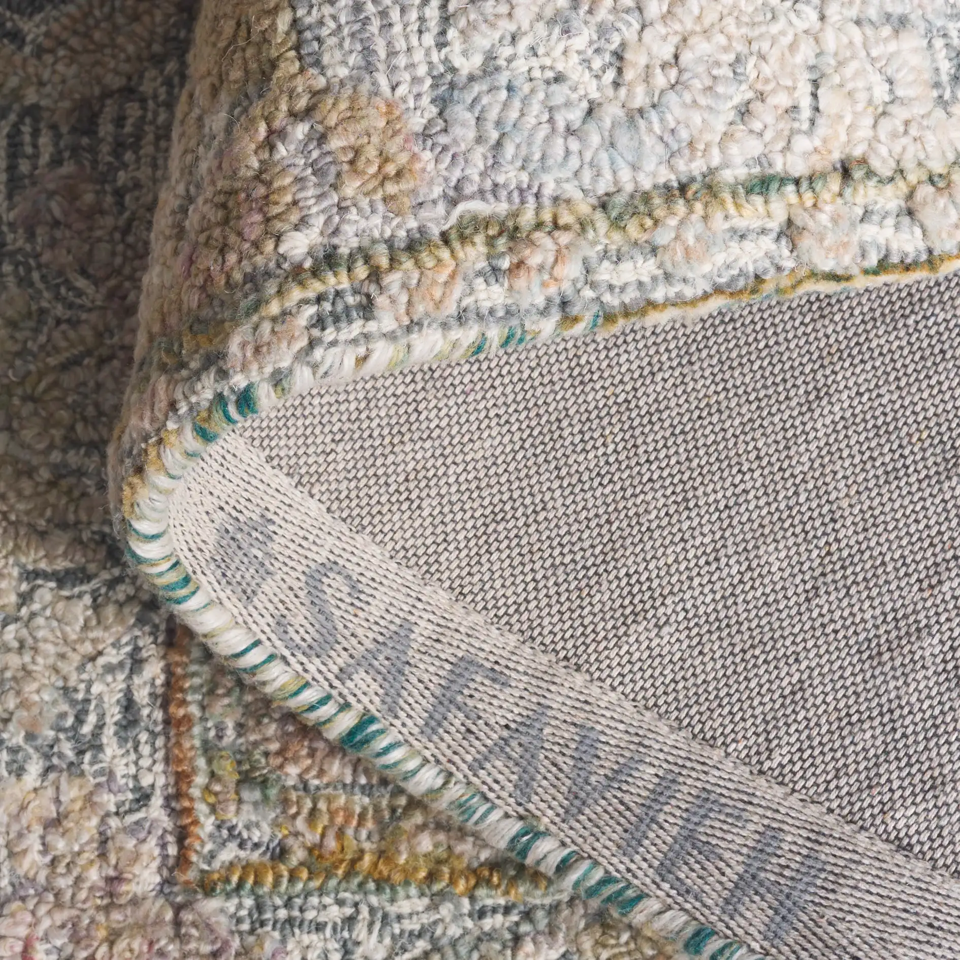 Marquee Medallion Hand-Tufted Rug in Green / Ivory in a styled room