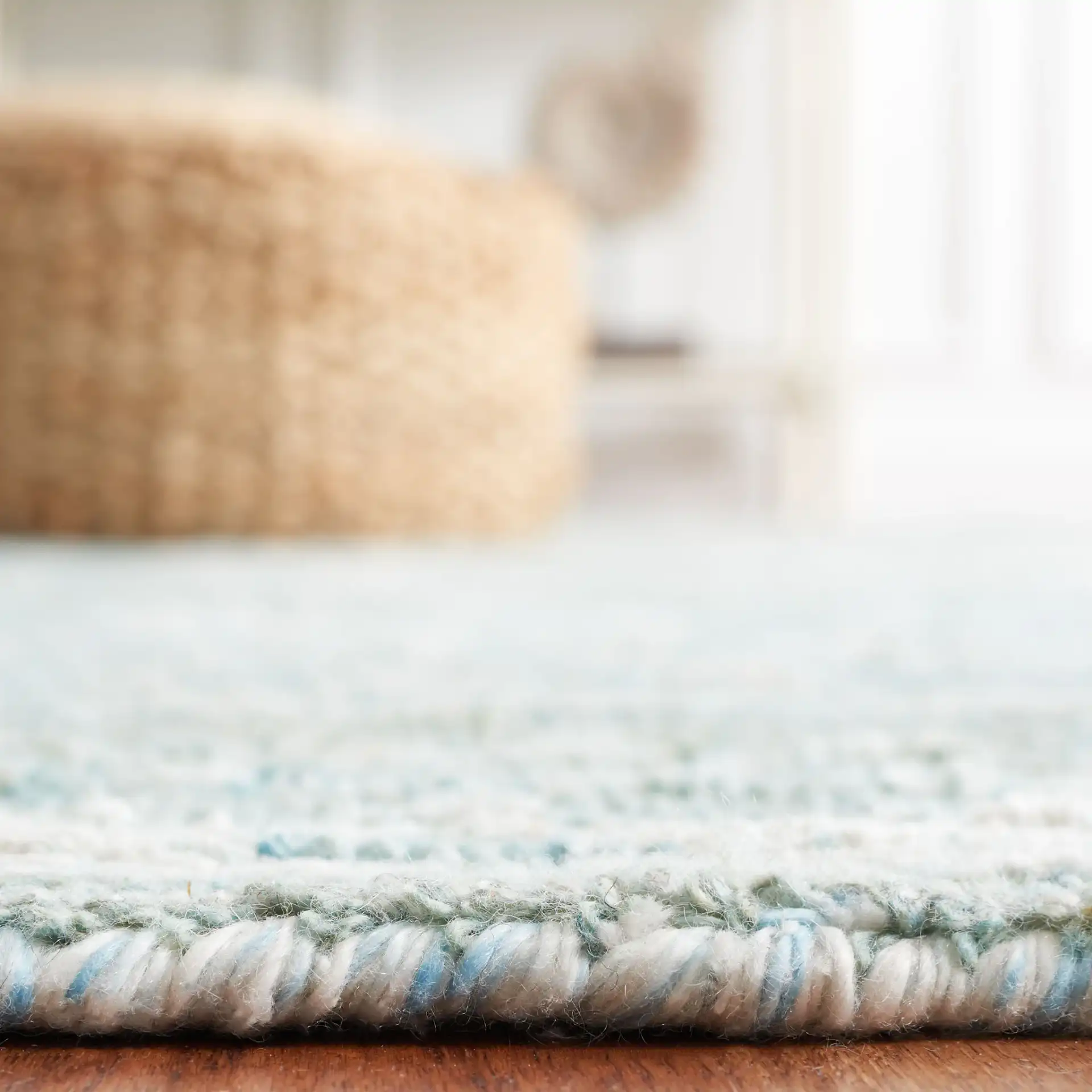 Marquee Floral Medallion Hand-Tufted Rug in Turquoise / Gray in a styled room