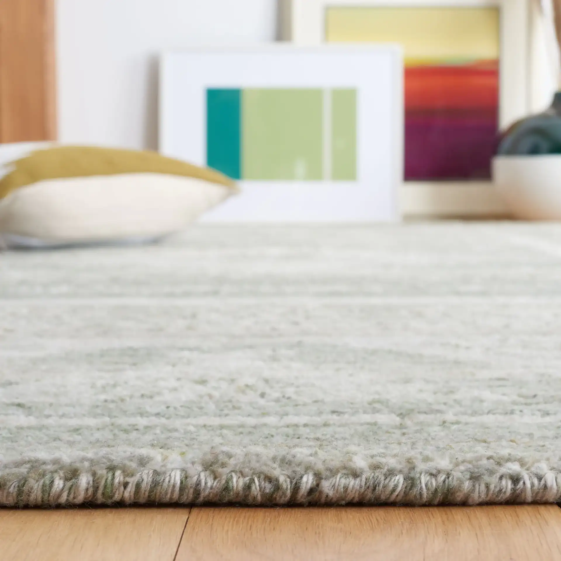Marquee Tribal Medallion Hand-Tufted Rug in Green / Sage in a styled room