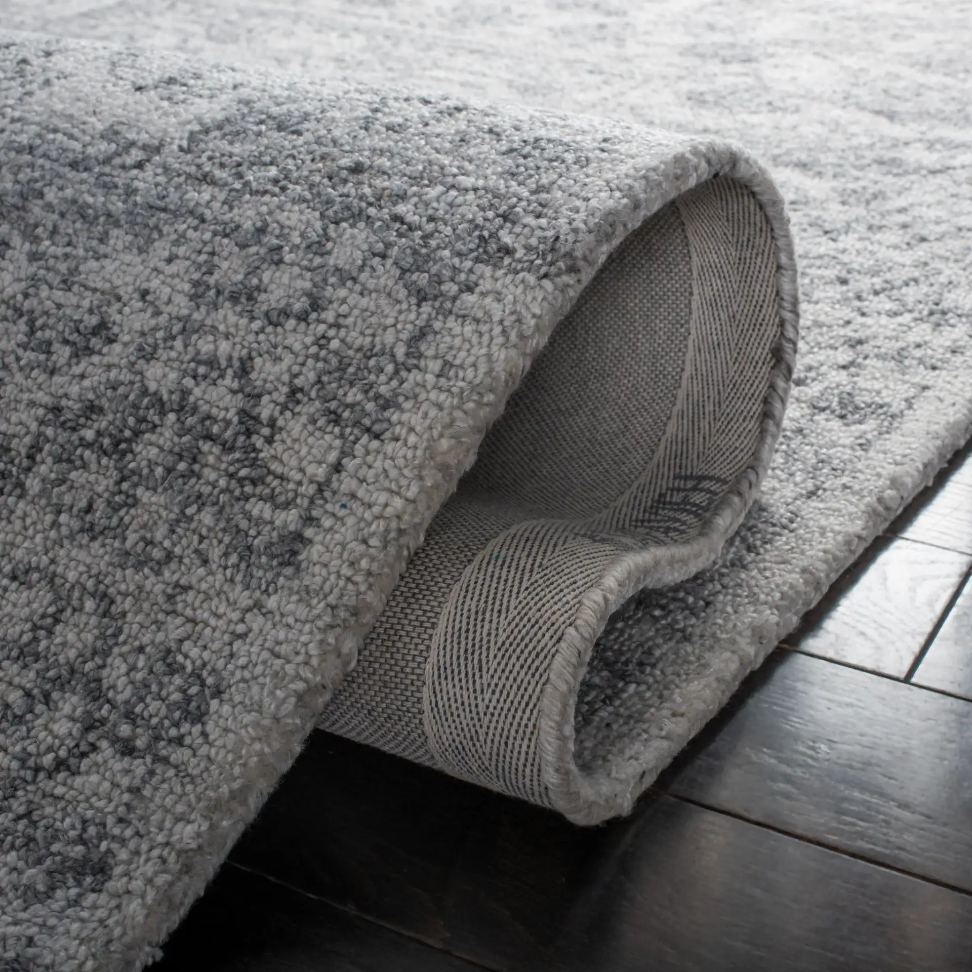 Marquee Faded Medallion Hand-Tufted Rug in Ivory / Gray in a styled room