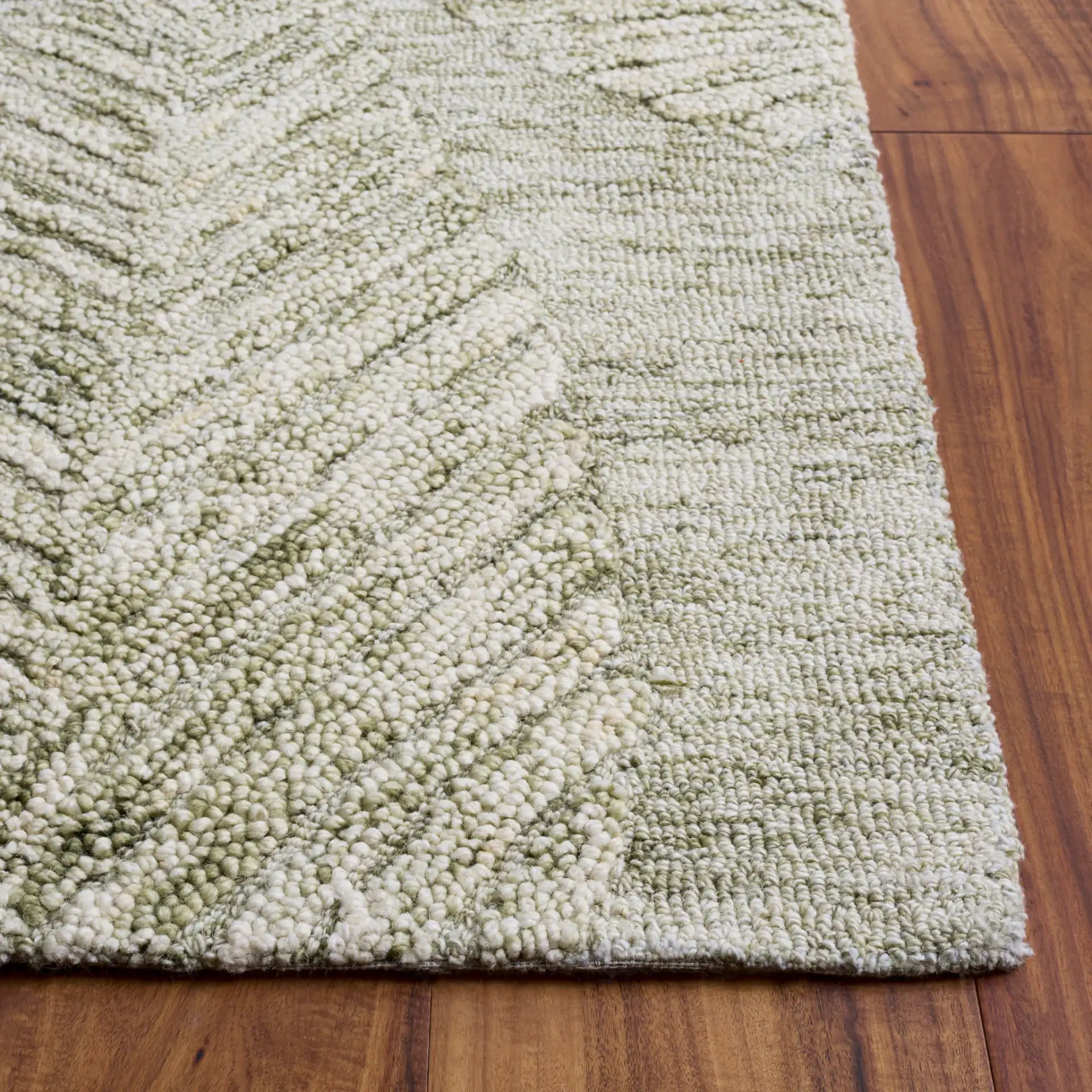 Marquee Transitional Leaf Hand-Tufted Wool Rug in Green / Ivory in a styled room