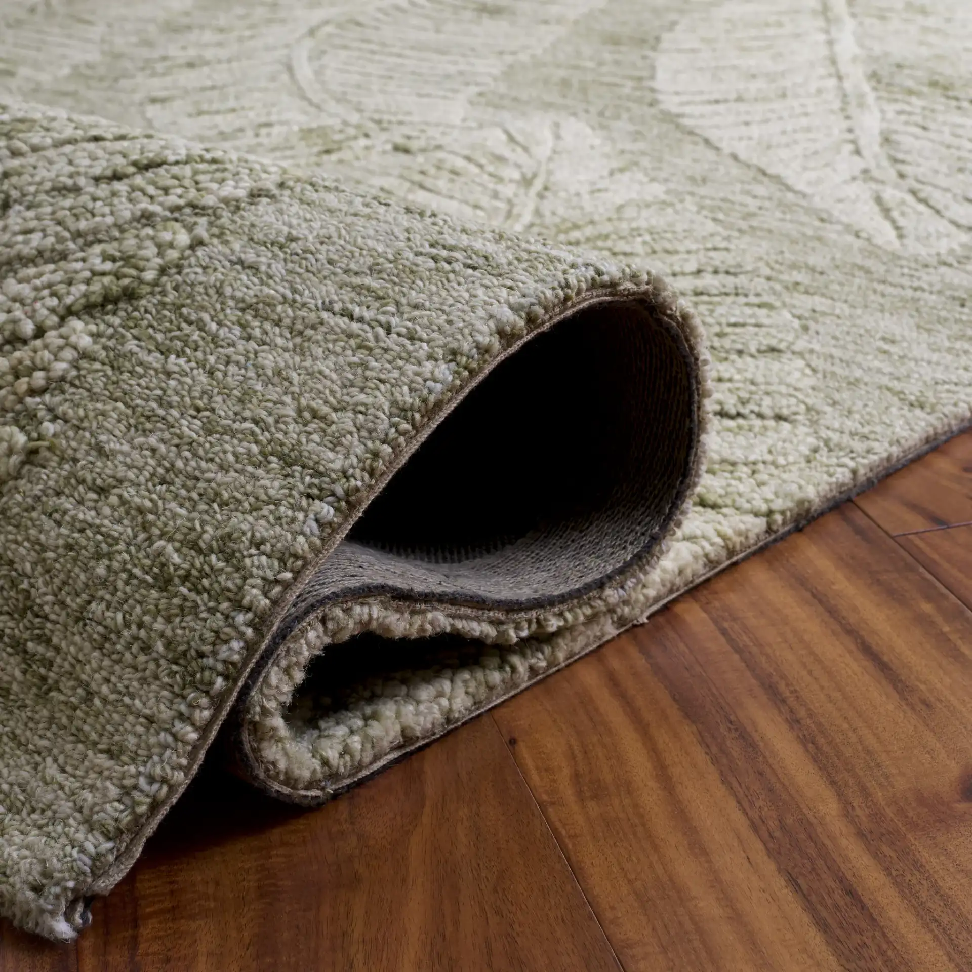 Marquee Transitional Leaf Hand-Tufted Wool Rug in Green / Ivory in a styled room
