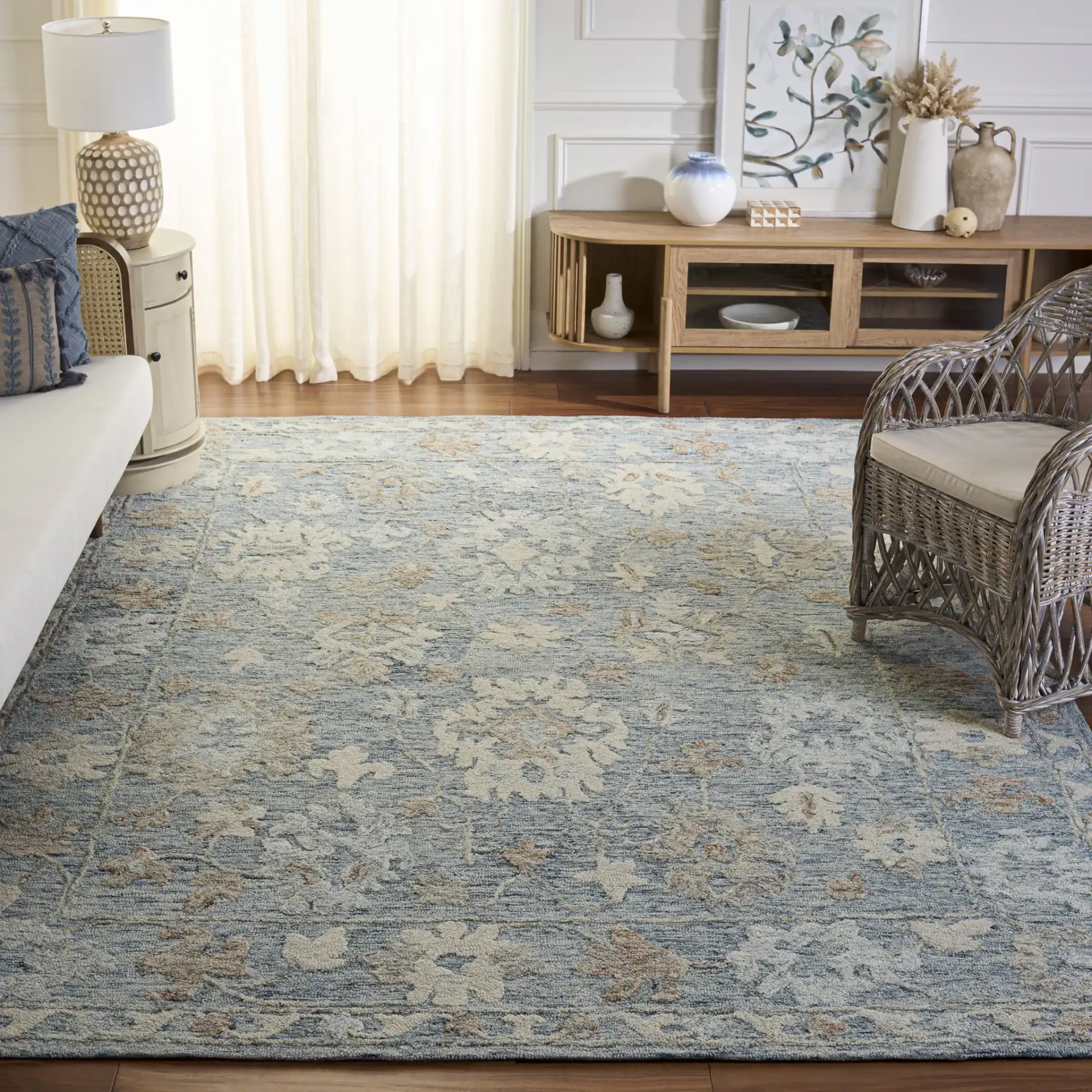 Marquee Oversized Floral Hand-Tufted Wool Rug in Blue / Rust in a styled room