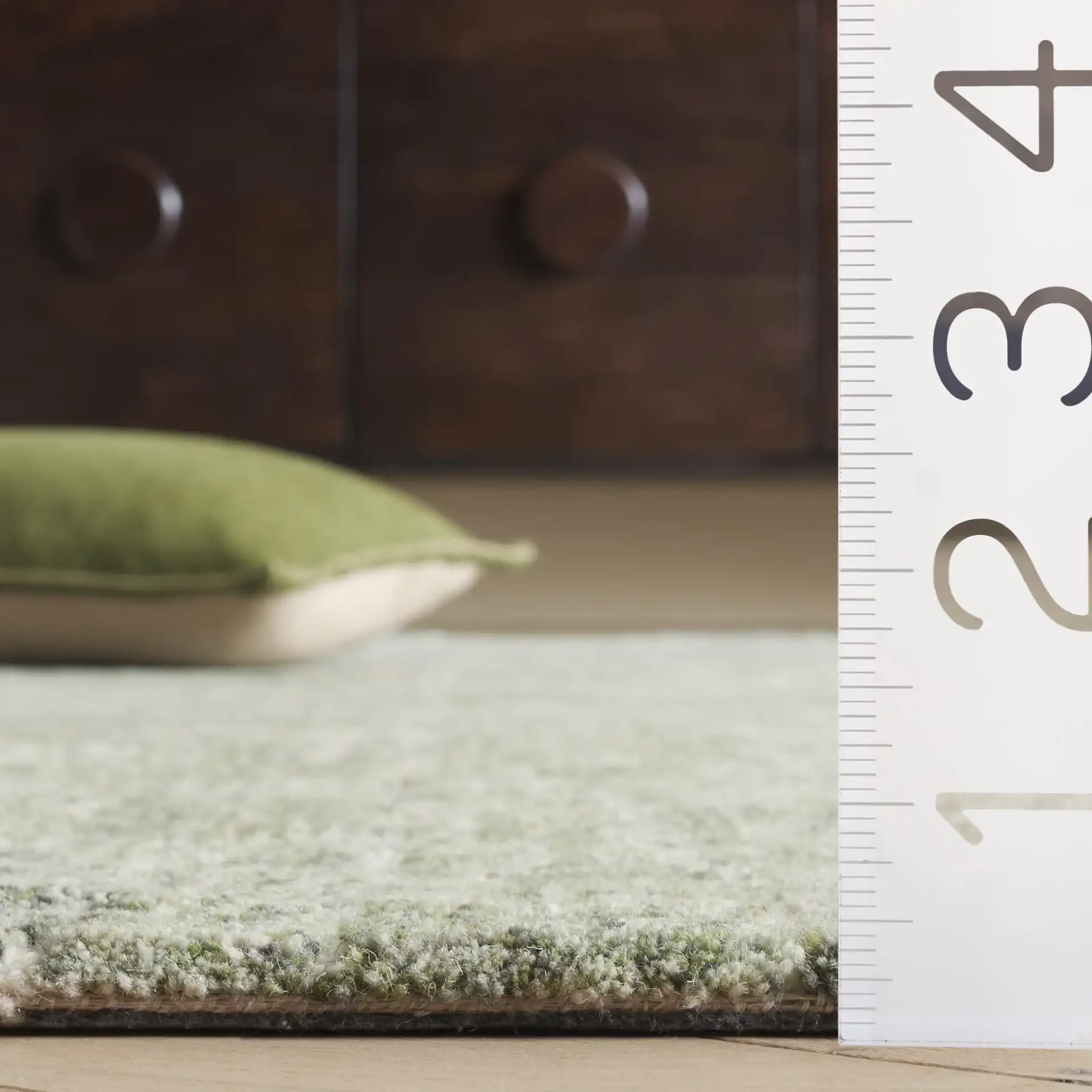 Marquee Mosaic Hand-Tufted Wool Rug in Green in a styled room