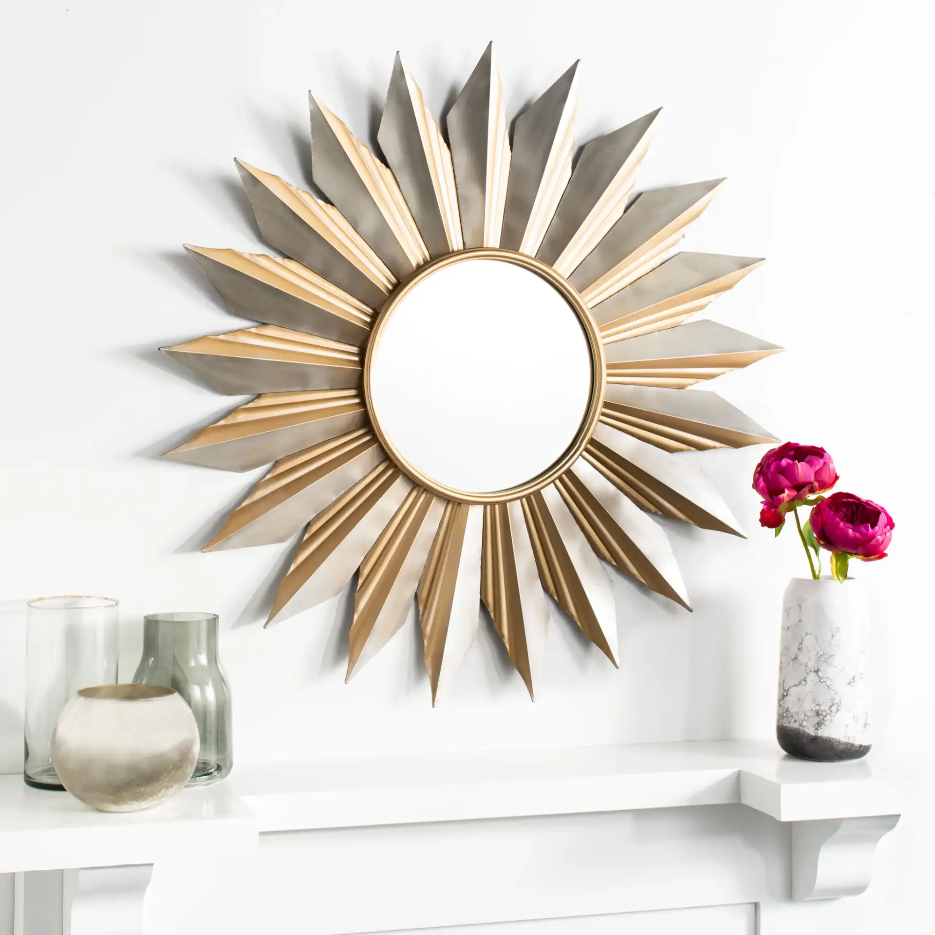 Bianca Sunburst Mirror in Gold in a styled room