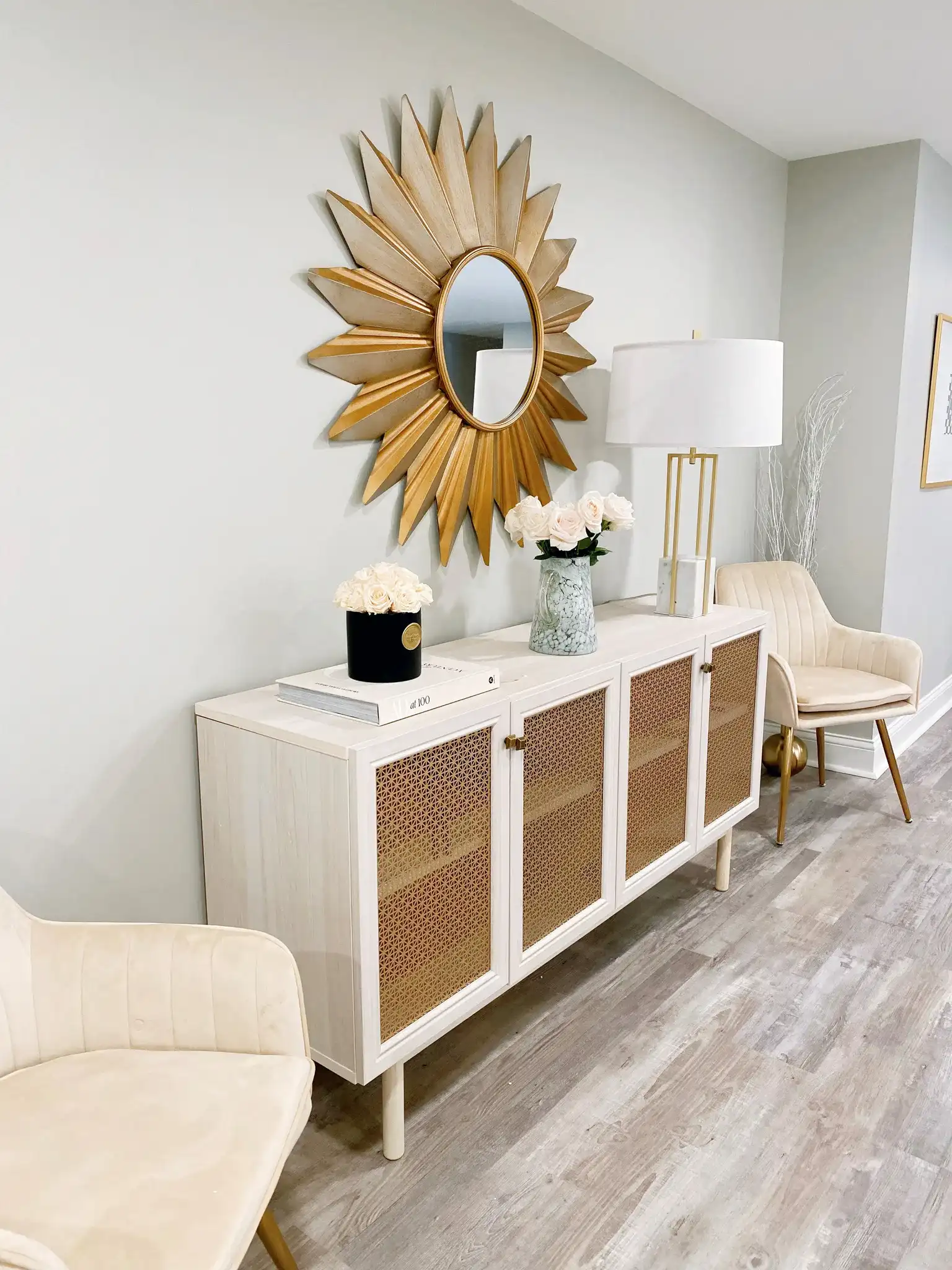 Bianca Sunburst Mirror in Gold in a styled room