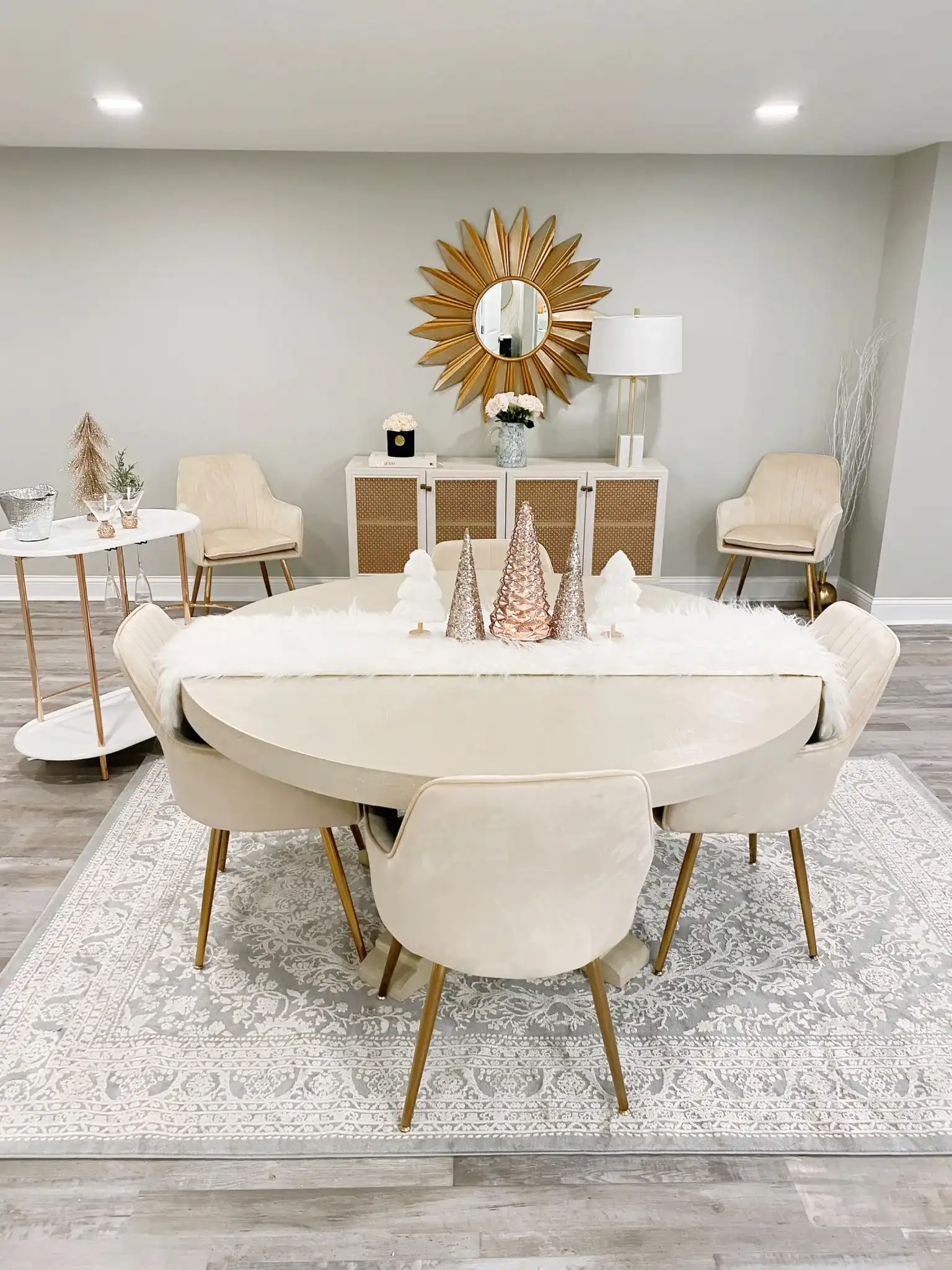 Bianca Sunburst Mirror in Gold in a styled room