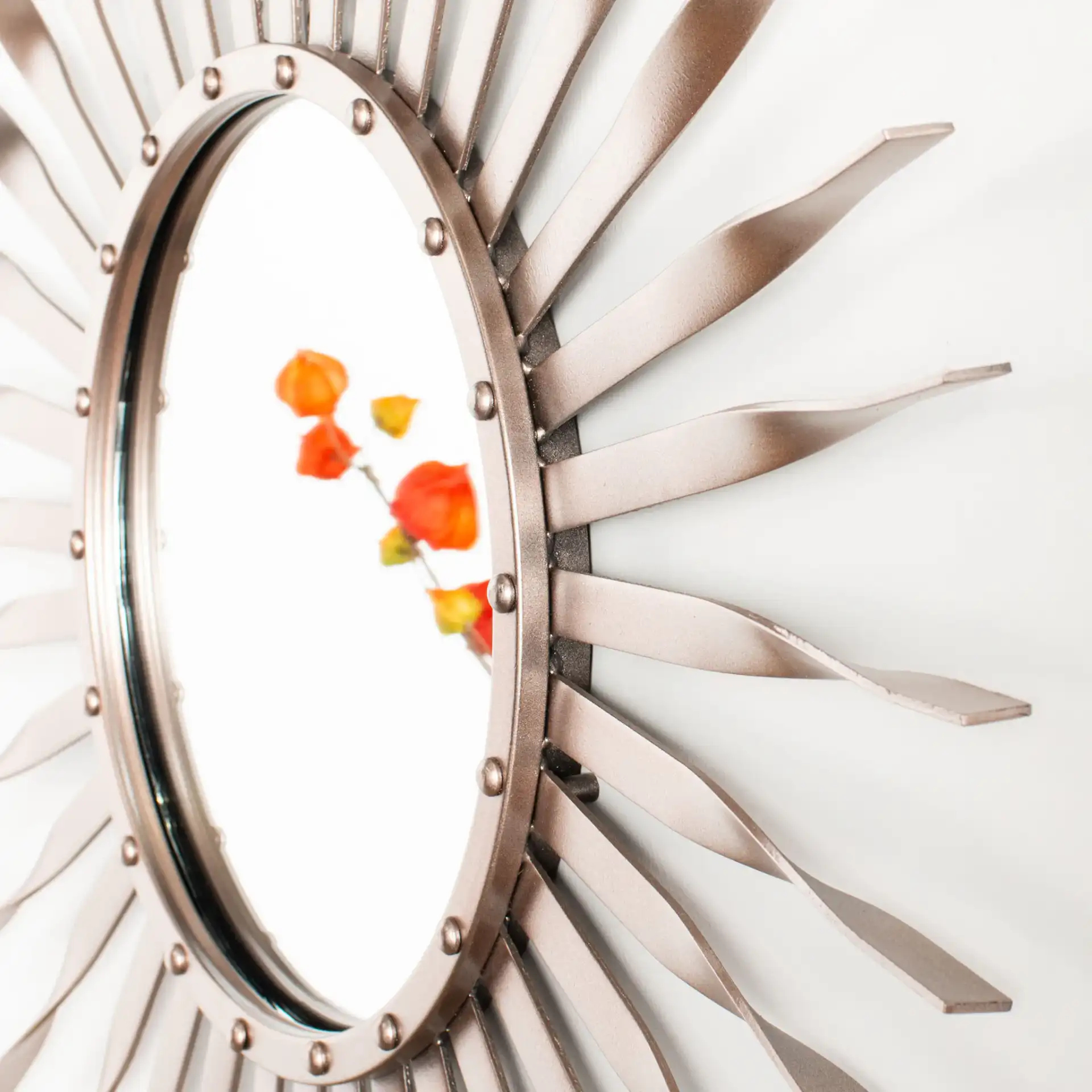 Marlene Sunburst Mirror in Rose Gold in a styled room