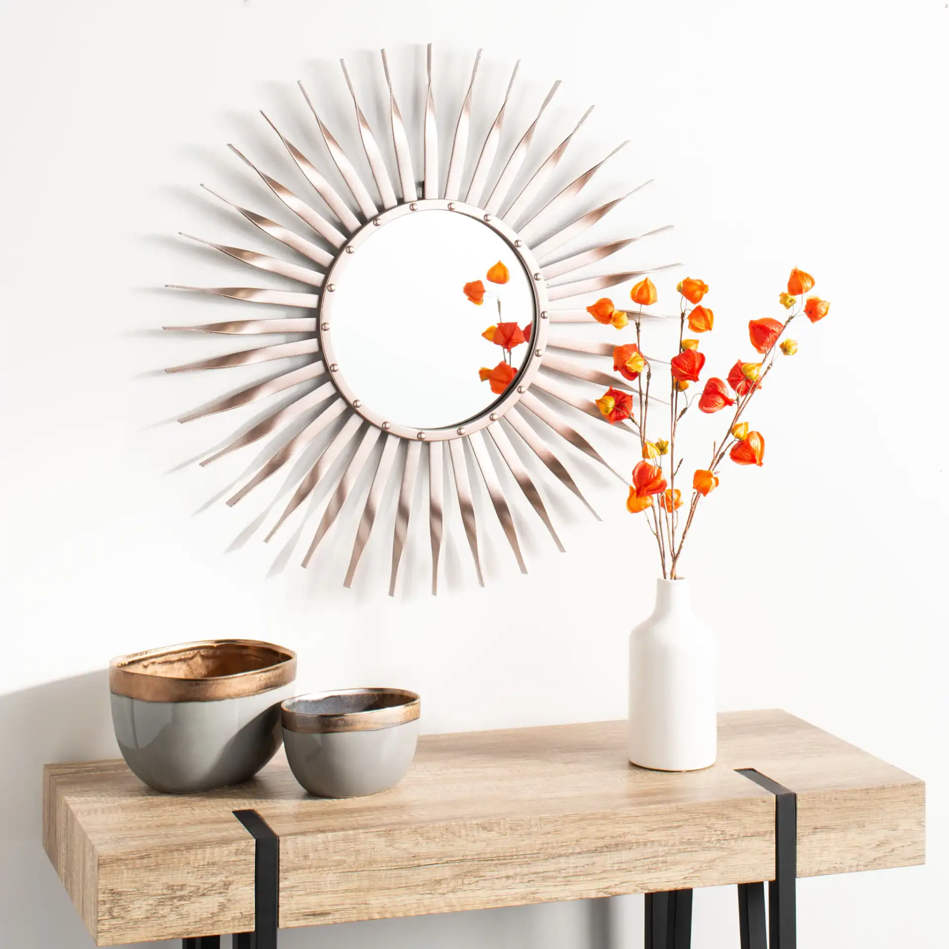 Marlene Sunburst Mirror in Rose Gold in a styled room