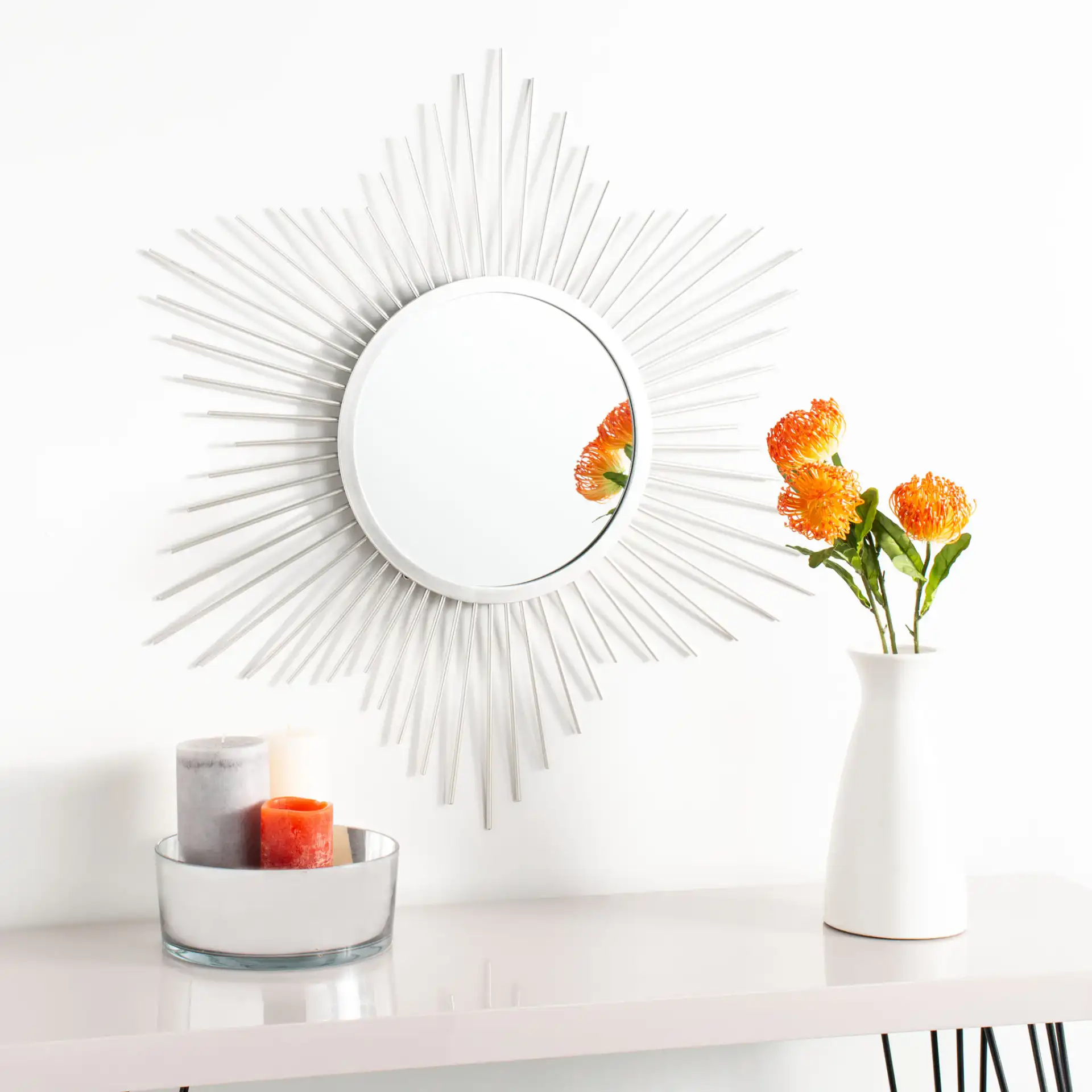 River Sunburst Mirror in Silver in a styled room