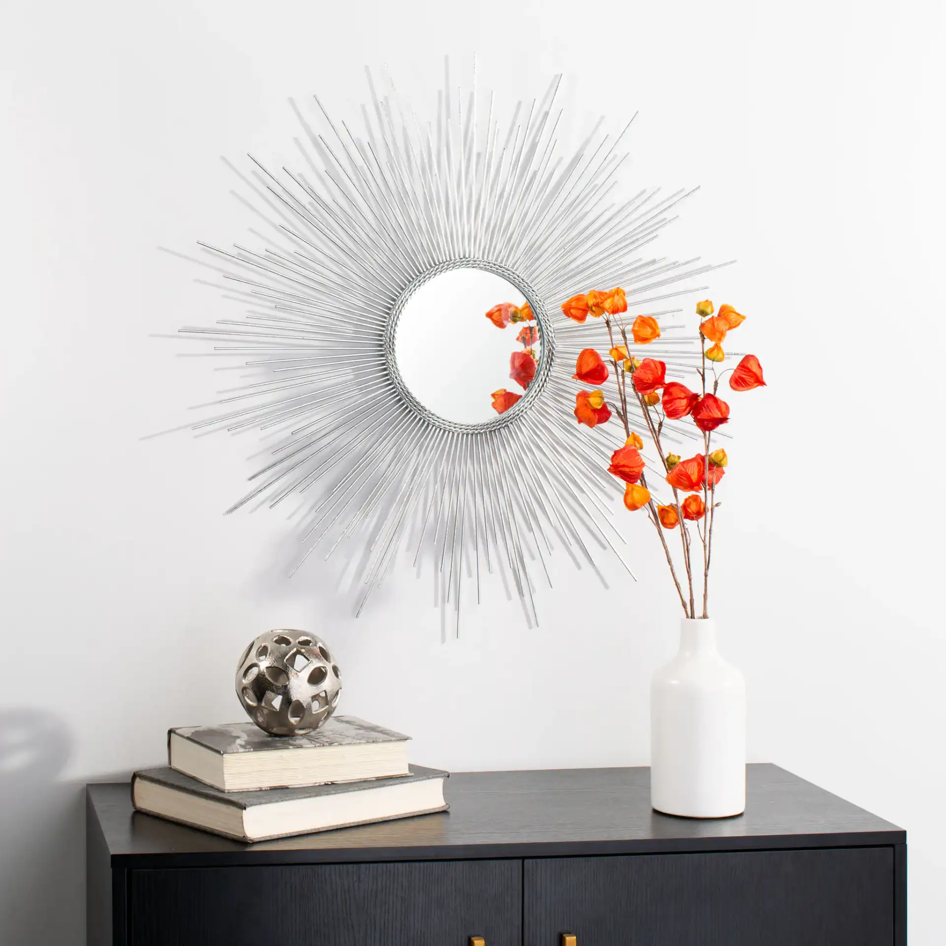 Emme Sunburst Mirror in Silver in a styled room
