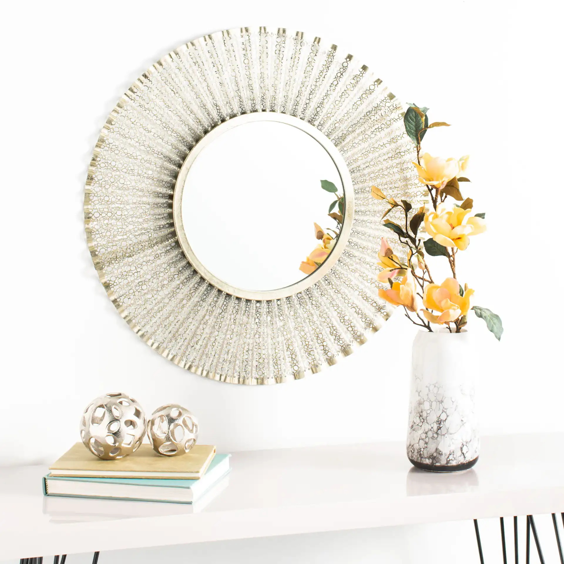 Foster Mirror in Gold in a styled room