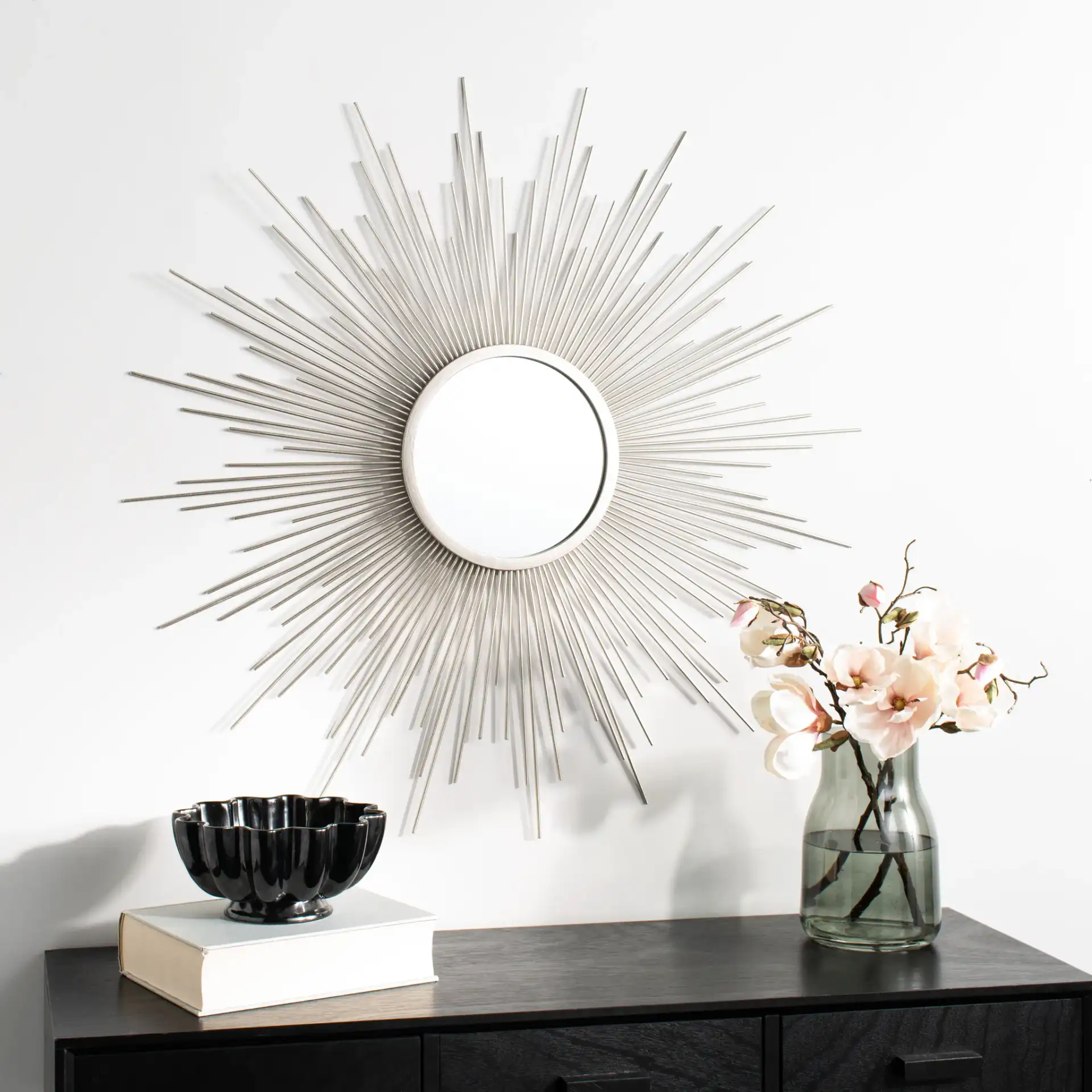 Madilyn Sunburst Mirror in Champagne in a styled room