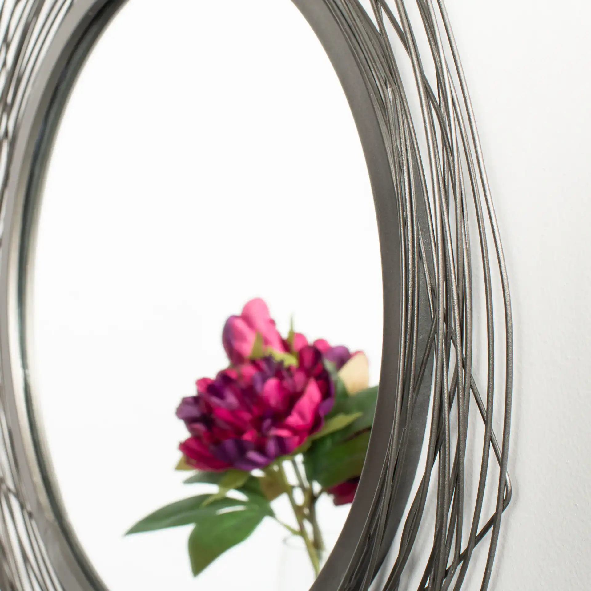 Nixie Mirror in Black in a styled room
