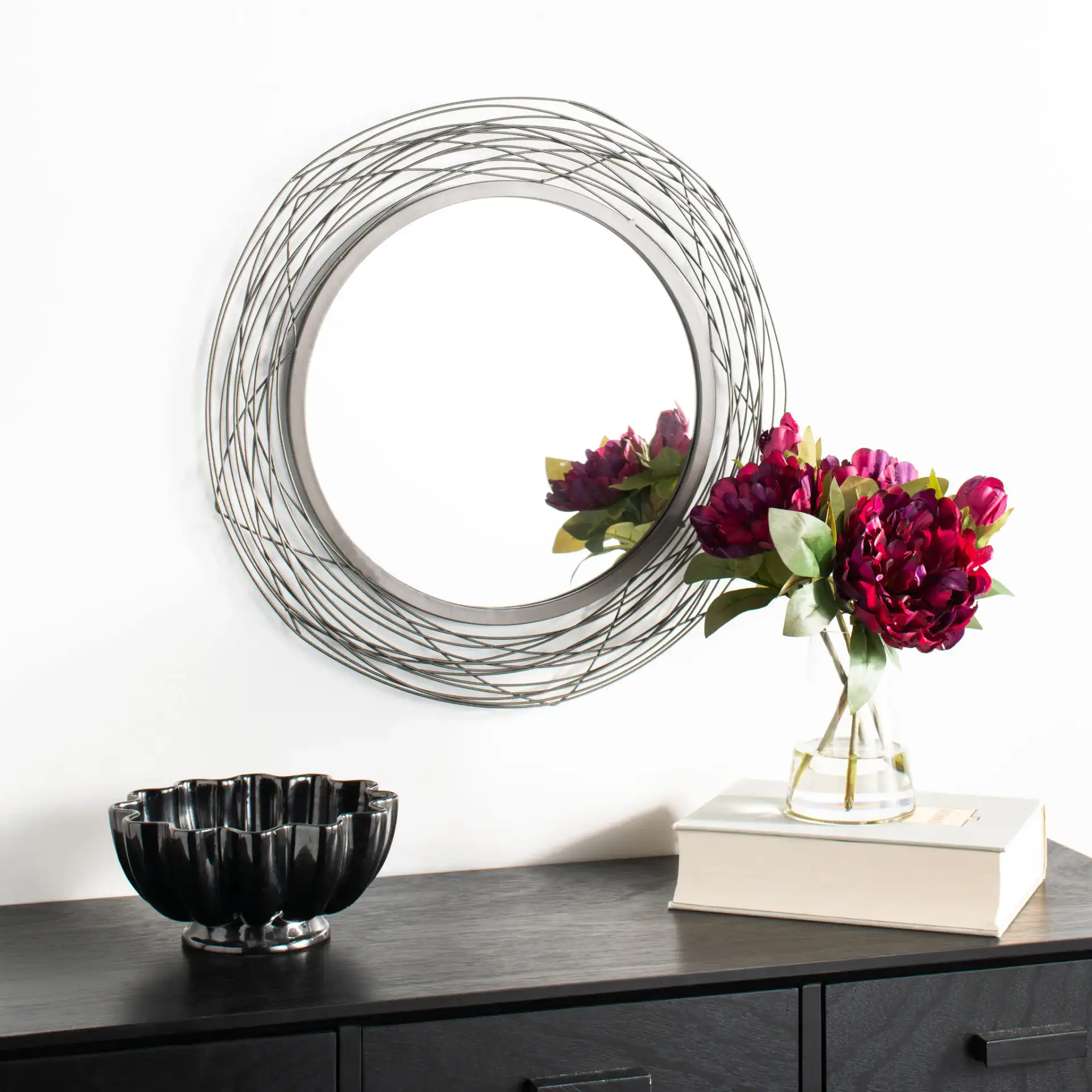 Nixie Mirror in Black in a styled room