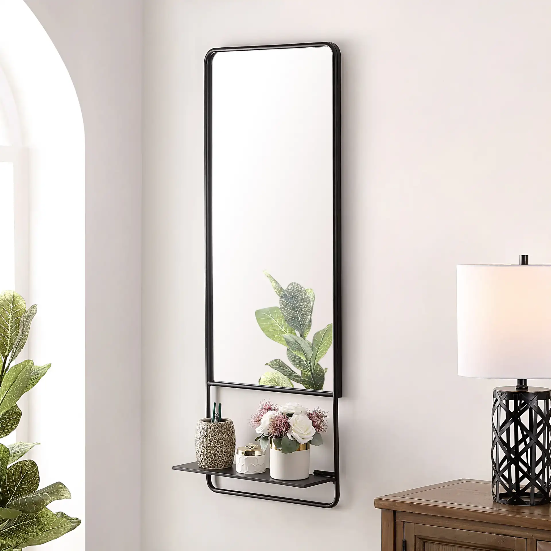 Trinsy Mirror in Black in a styled room