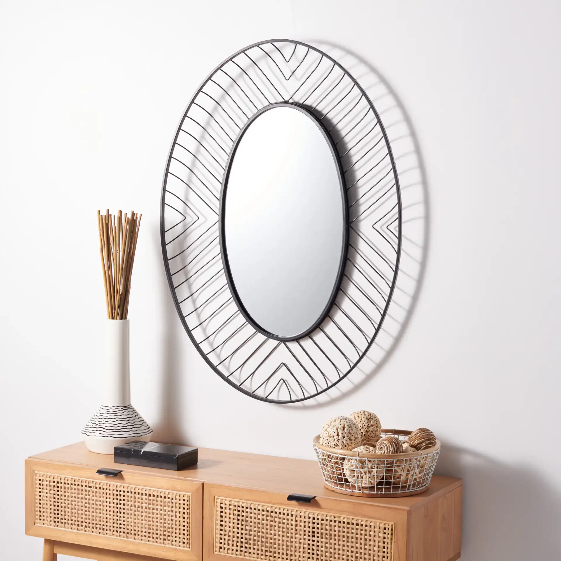 Tanra 26.75" Mirror in Black in a styled room