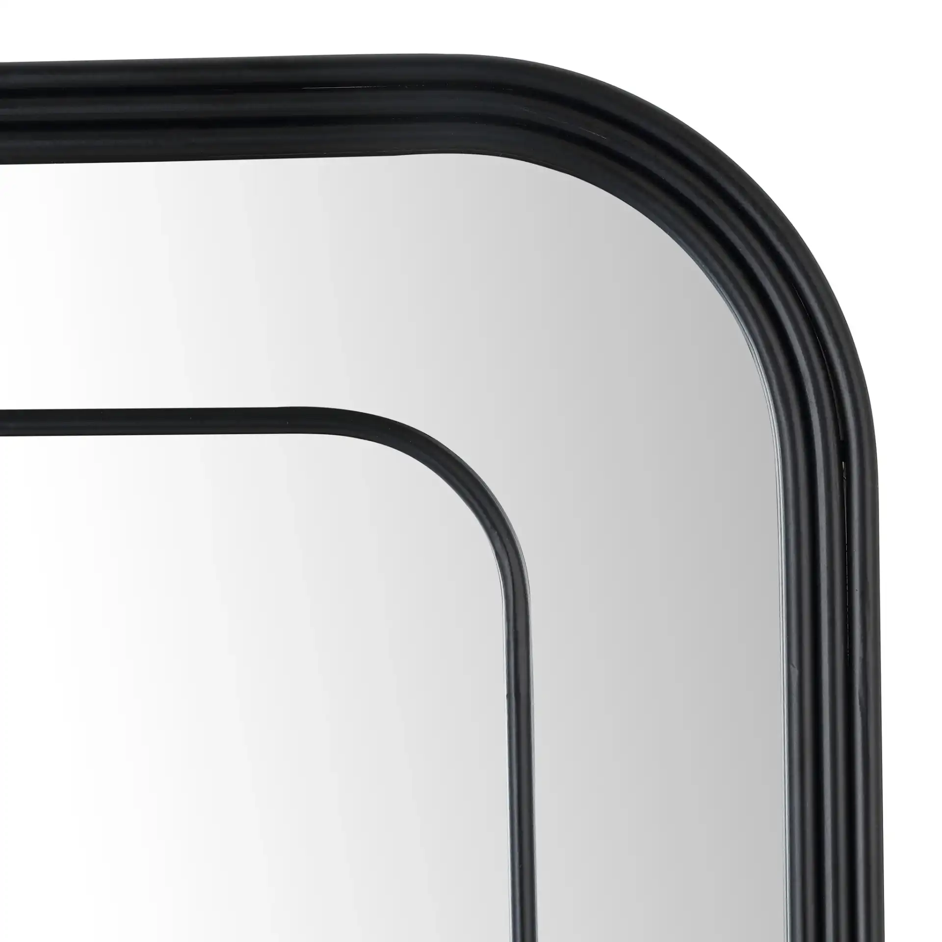 Silter 22-Inch Mirror in Black in a styled room