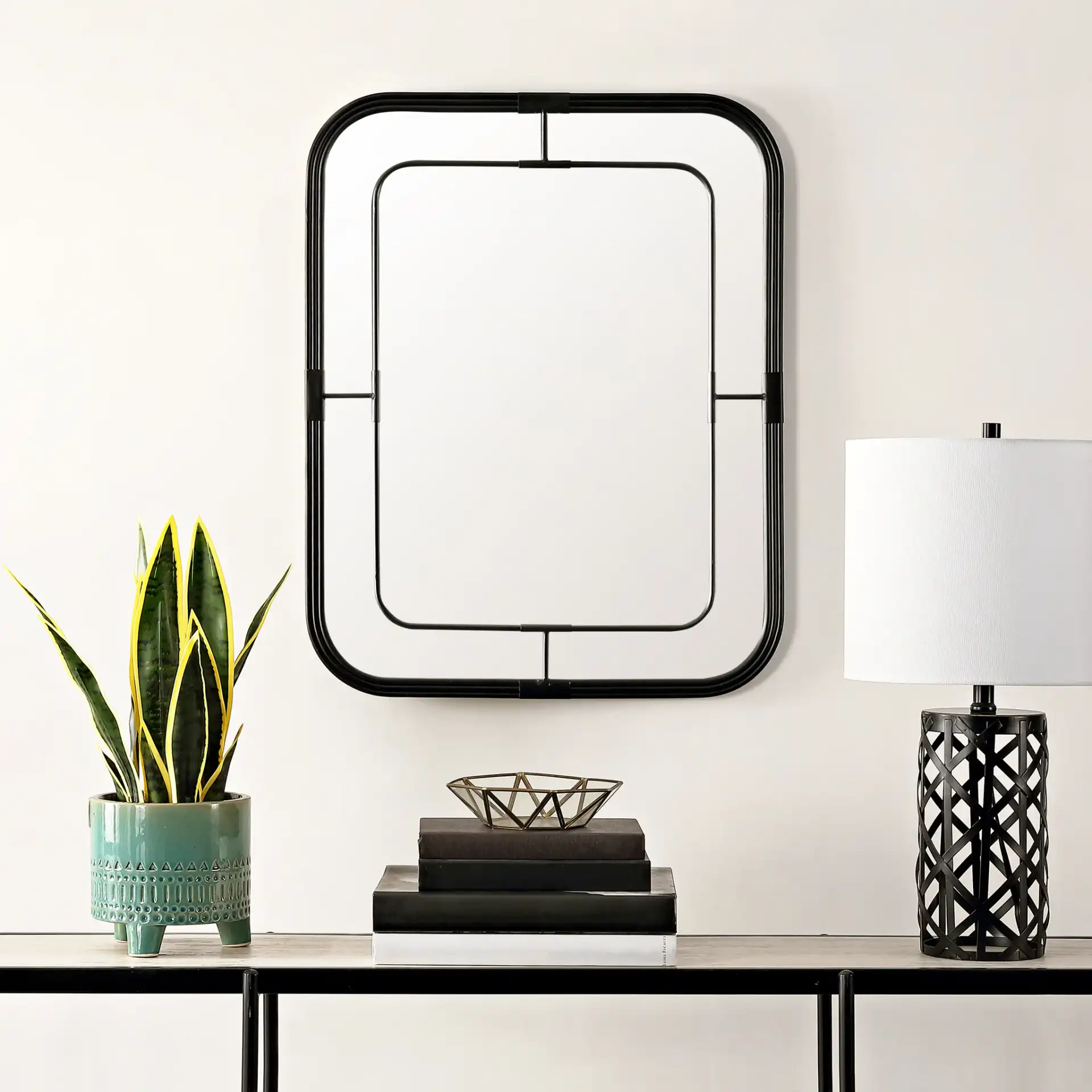 Silter 22-Inch Mirror in Black in a styled room