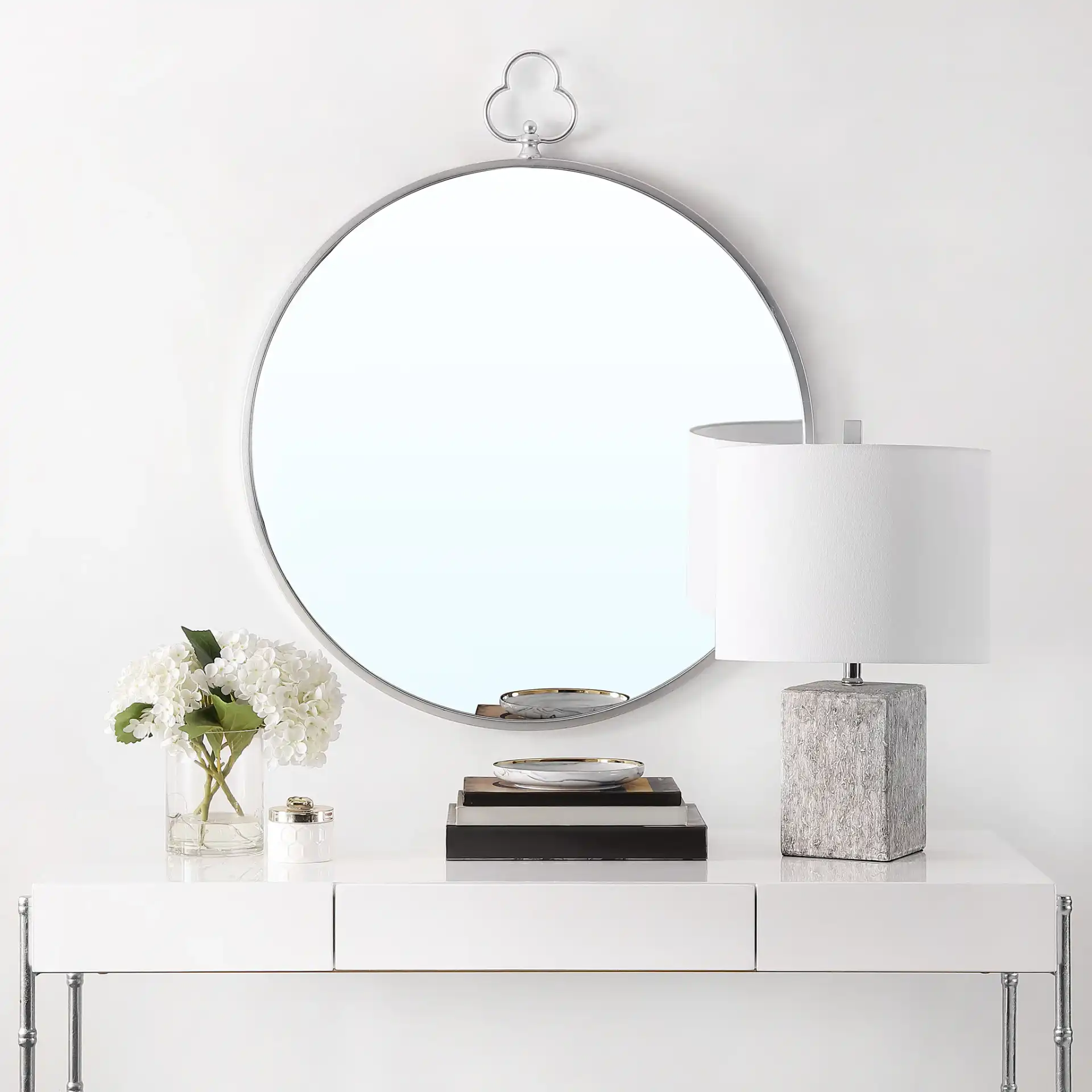 Cosra Mirror in Silver in a styled room