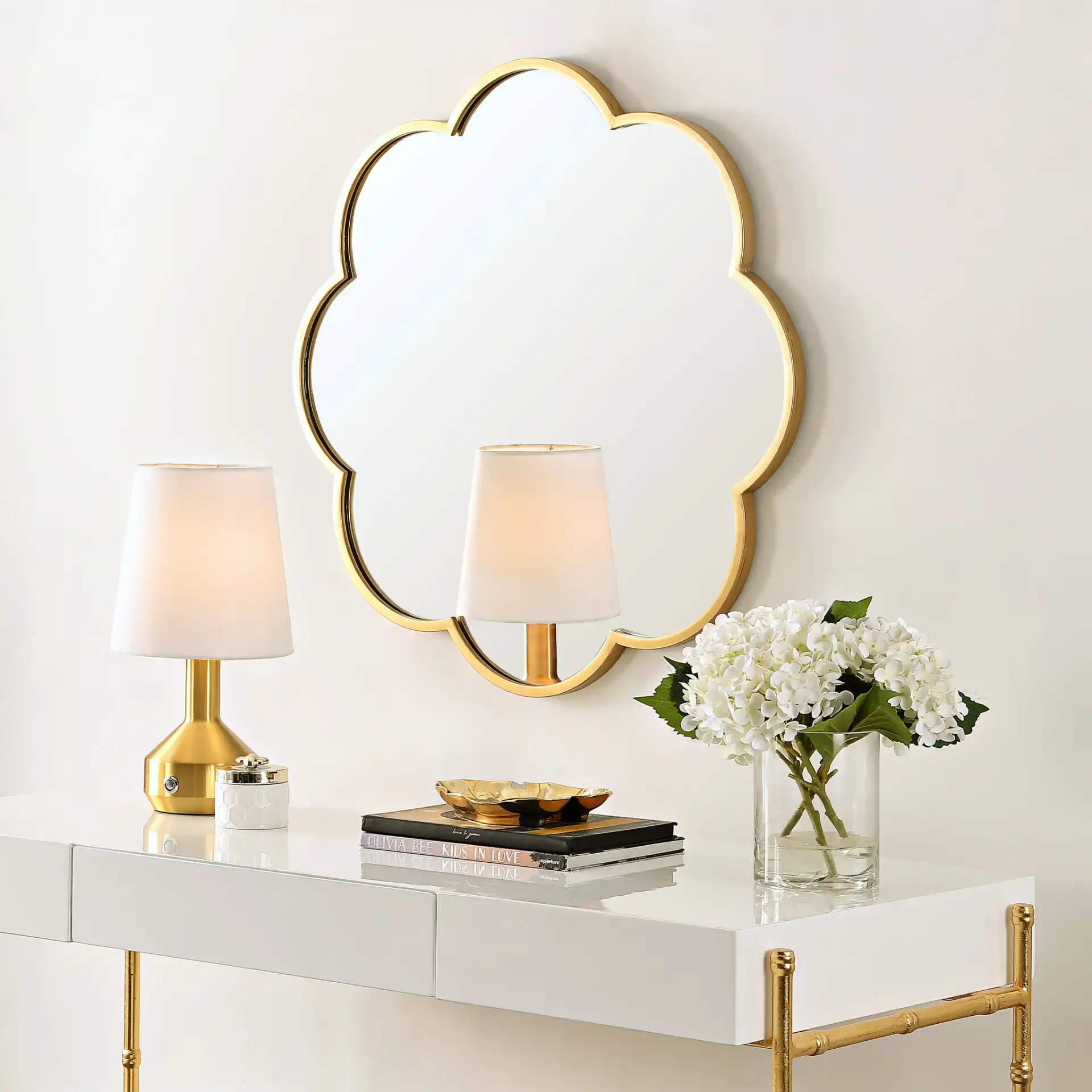 Kessli 28-Inch Mirror in Gold in a styled room