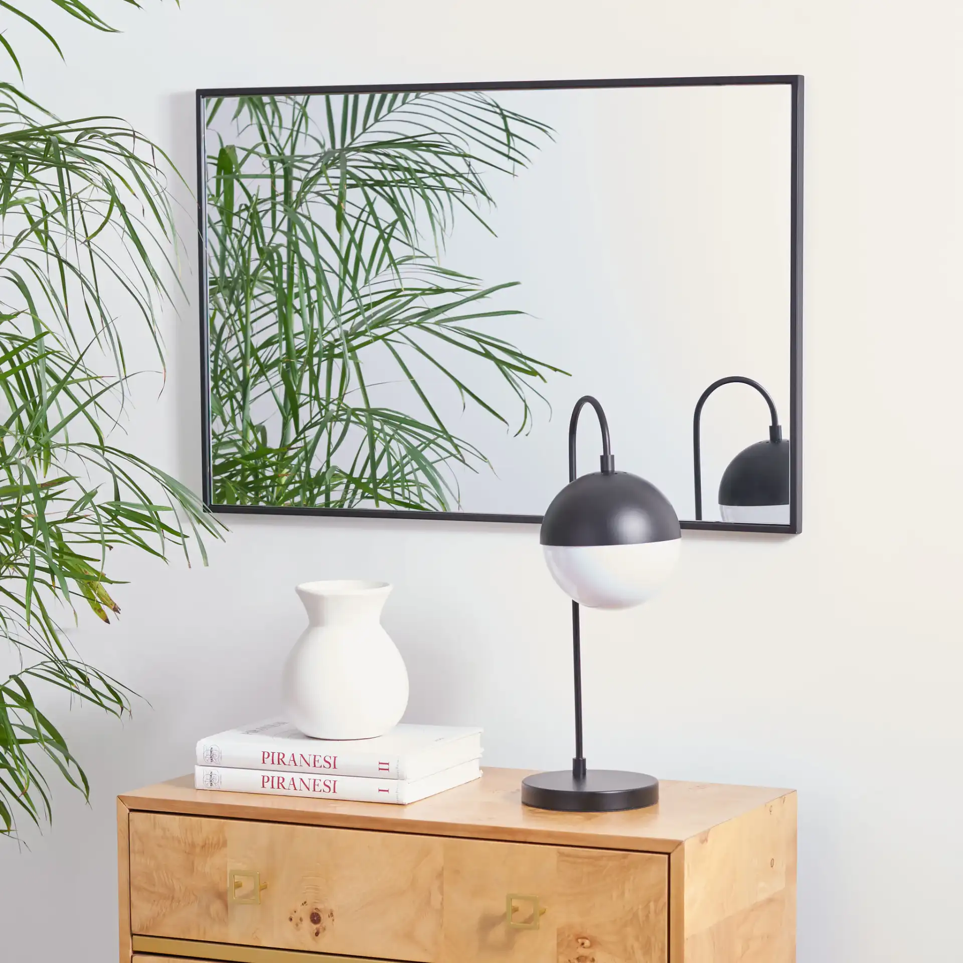 Yesmi 24" Mirror in Black in a styled room
